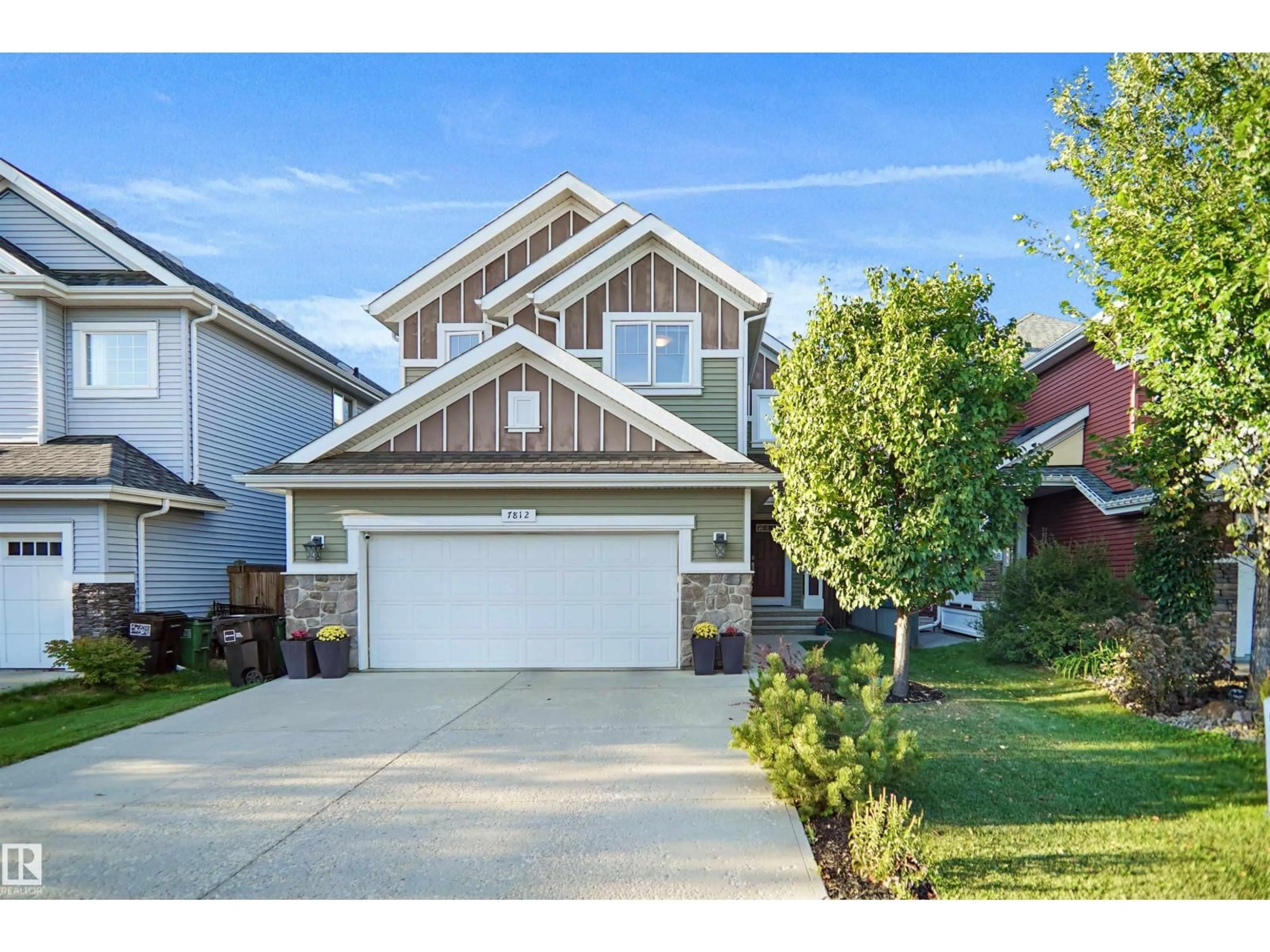 Home with vinyl exterior material, street for SW - 7812 18 AV, Edmonton Alberta T6X0V3