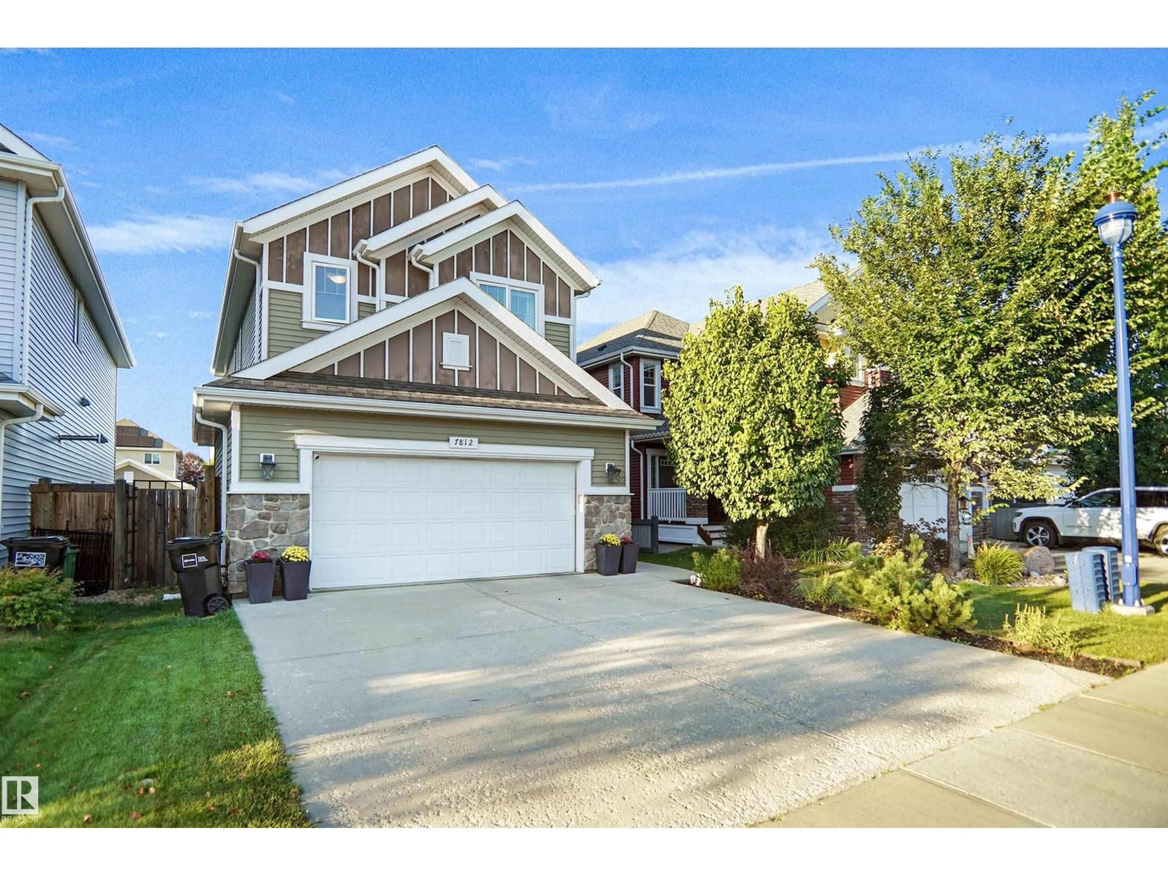 Home with vinyl exterior material, street for SW - 7812 18 AV, Edmonton Alberta T6X0V3