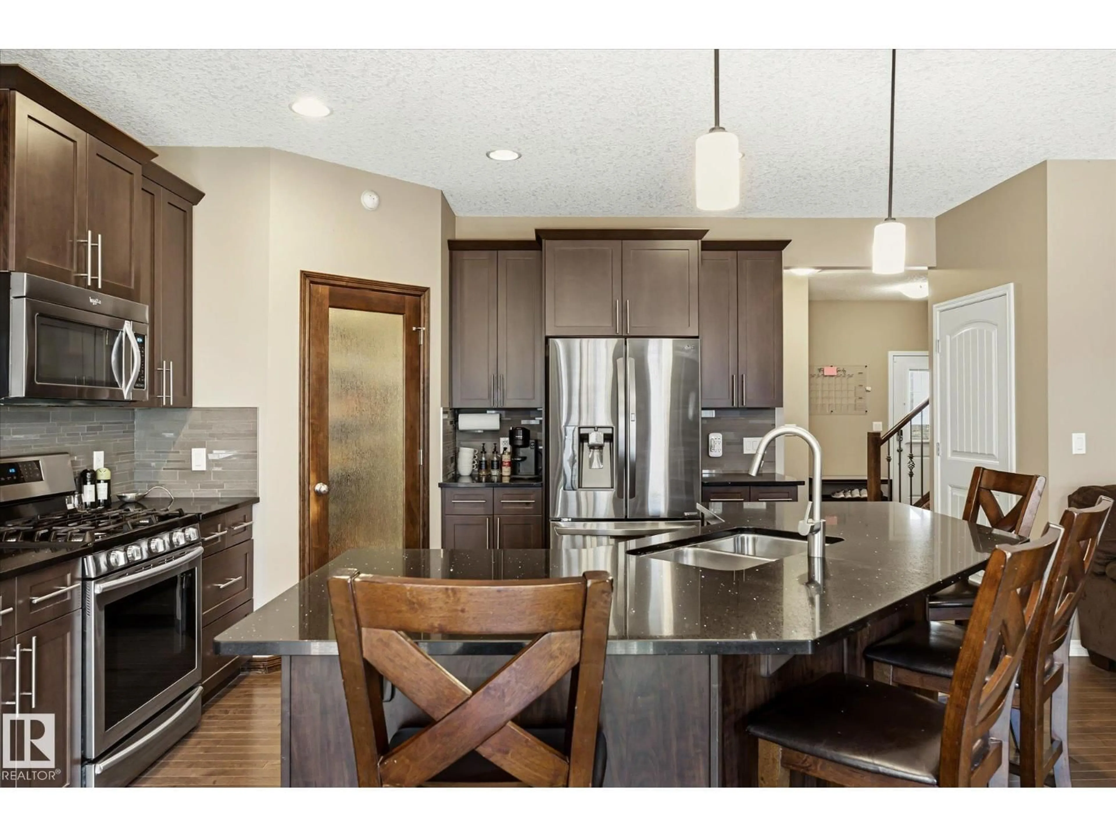 Open concept kitchen, unknown for 913 GOSHAWK PT, Edmonton Alberta T5S0H6