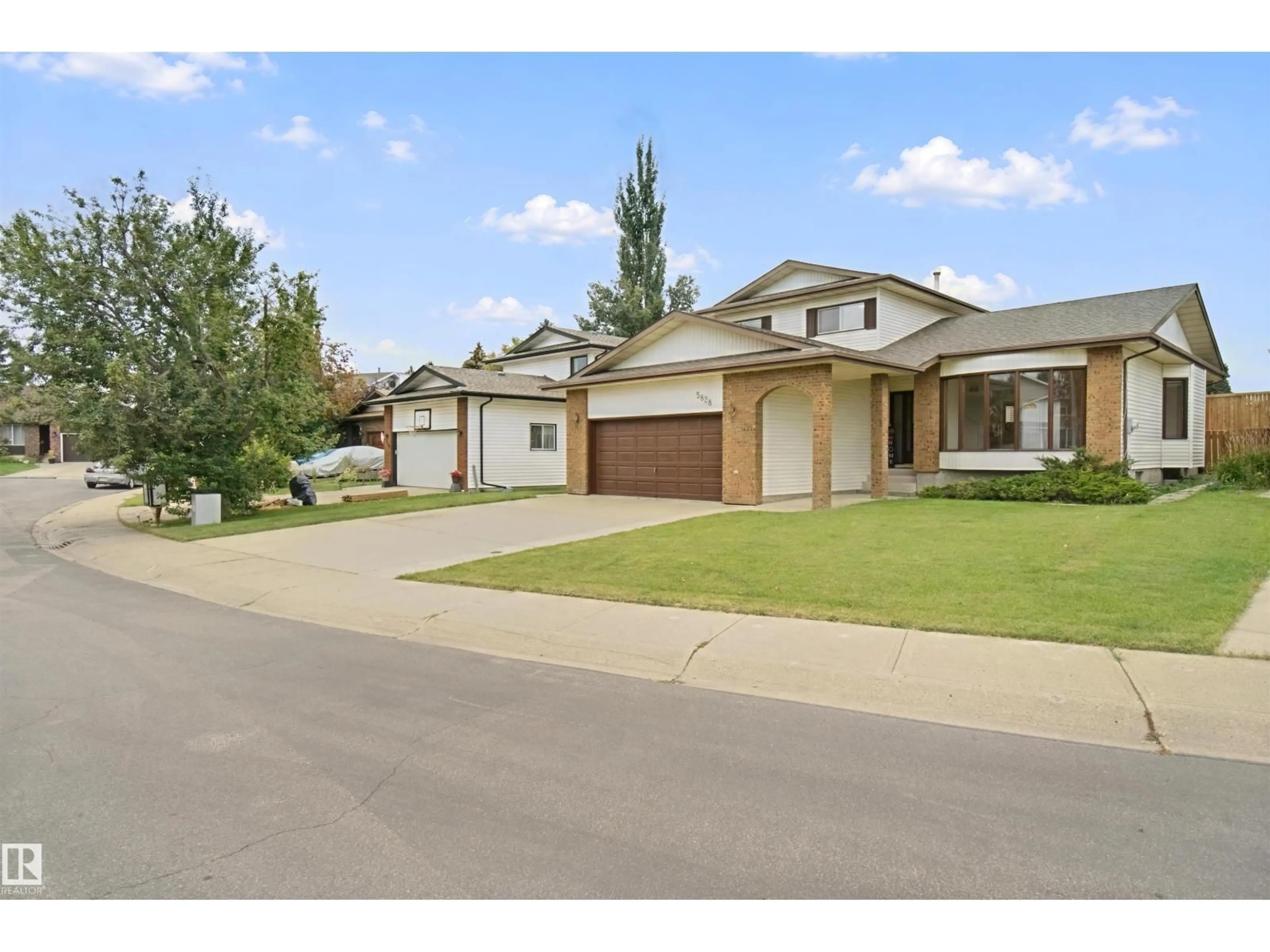 A pic from outside/outdoor area/front of a property/back of a property/a pic from drone, street for NW - 5828 181 ST, Edmonton Alberta T6M1V6