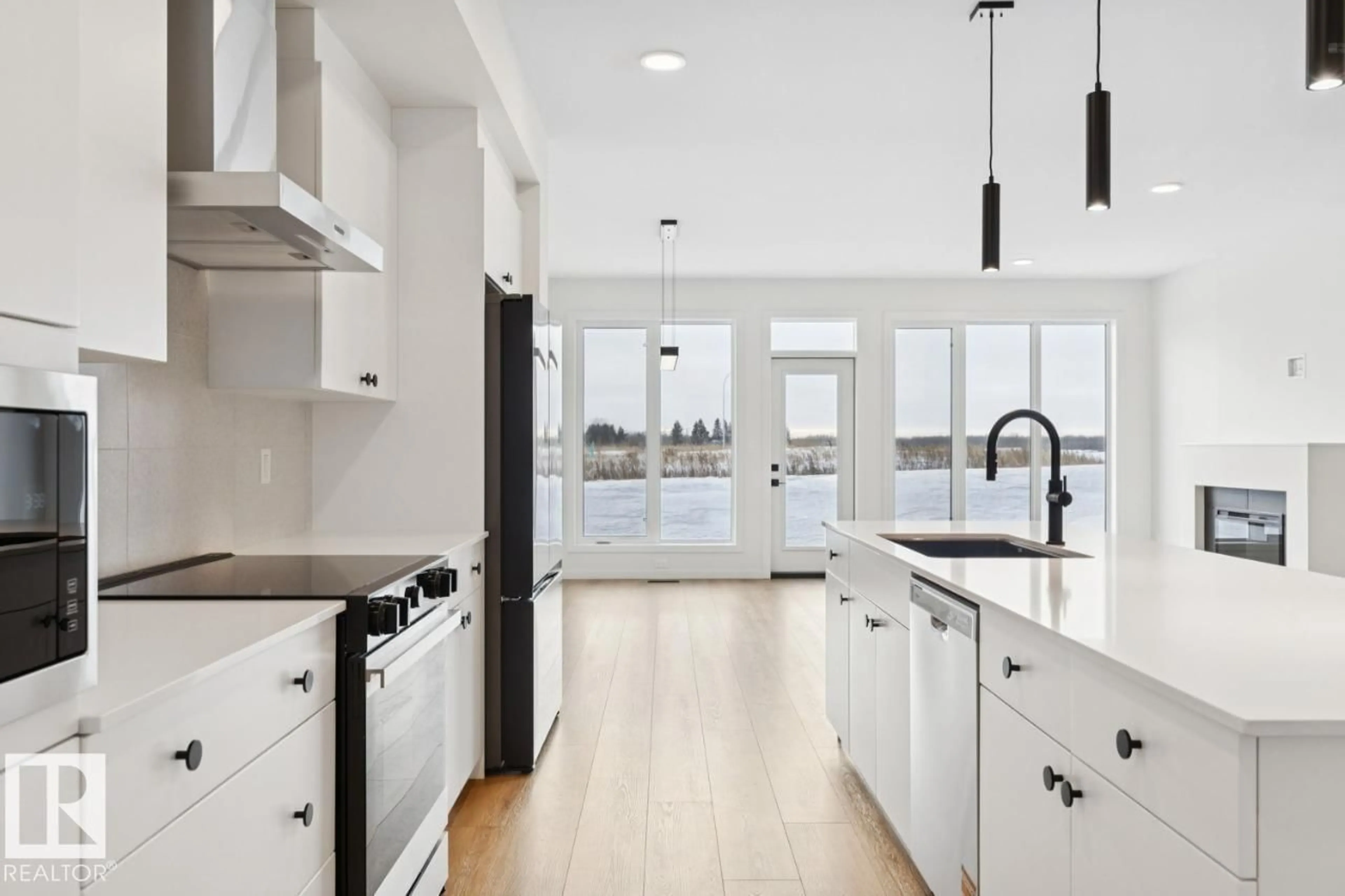 Open concept kitchen, ceramic/tile floor for 1566 KESWICK DR, Edmonton Alberta T6W5R8