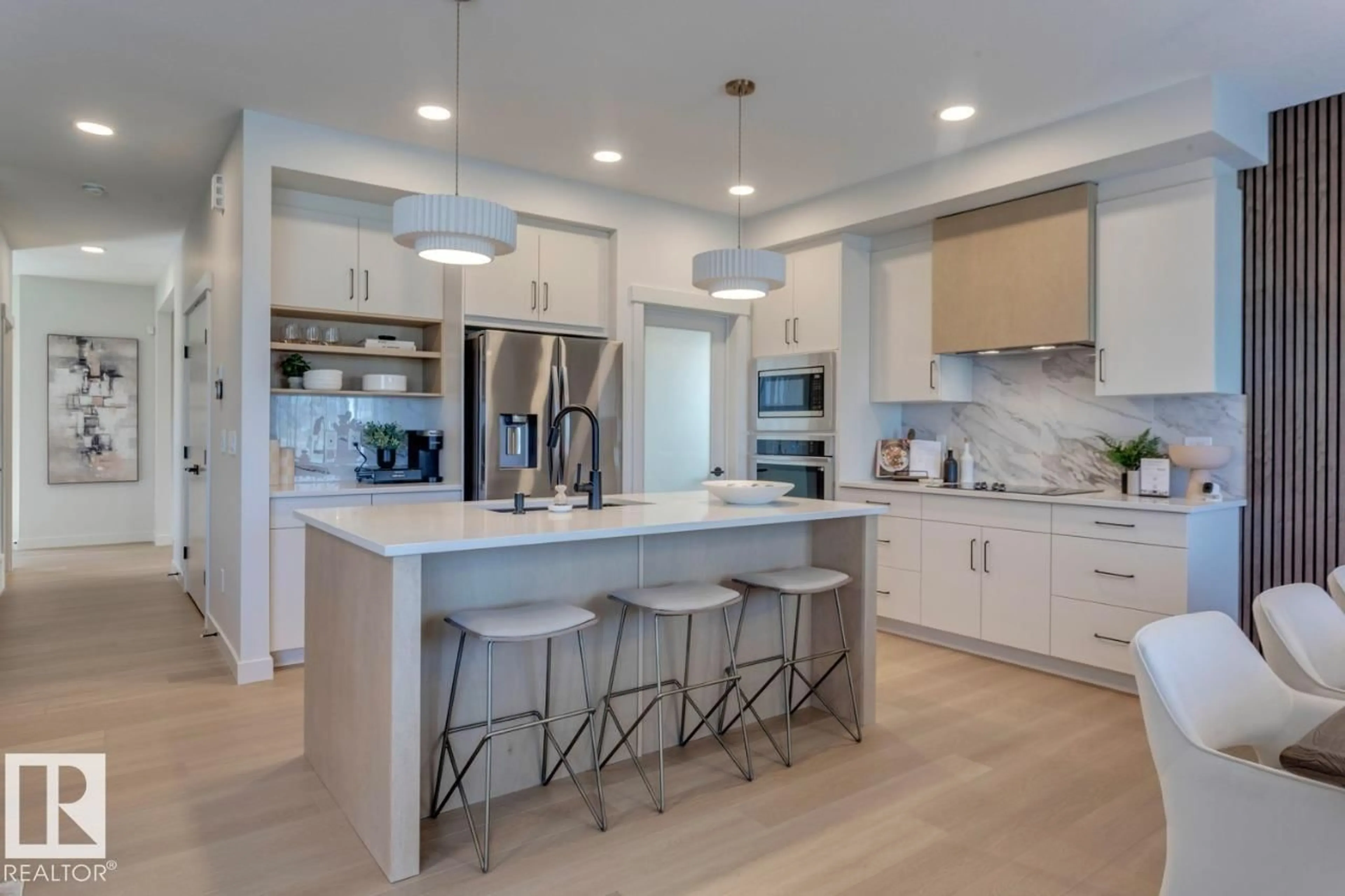 Open concept kitchen, ceramic/tile floor for 258 171A AV, Edmonton Alberta T5Y4N9