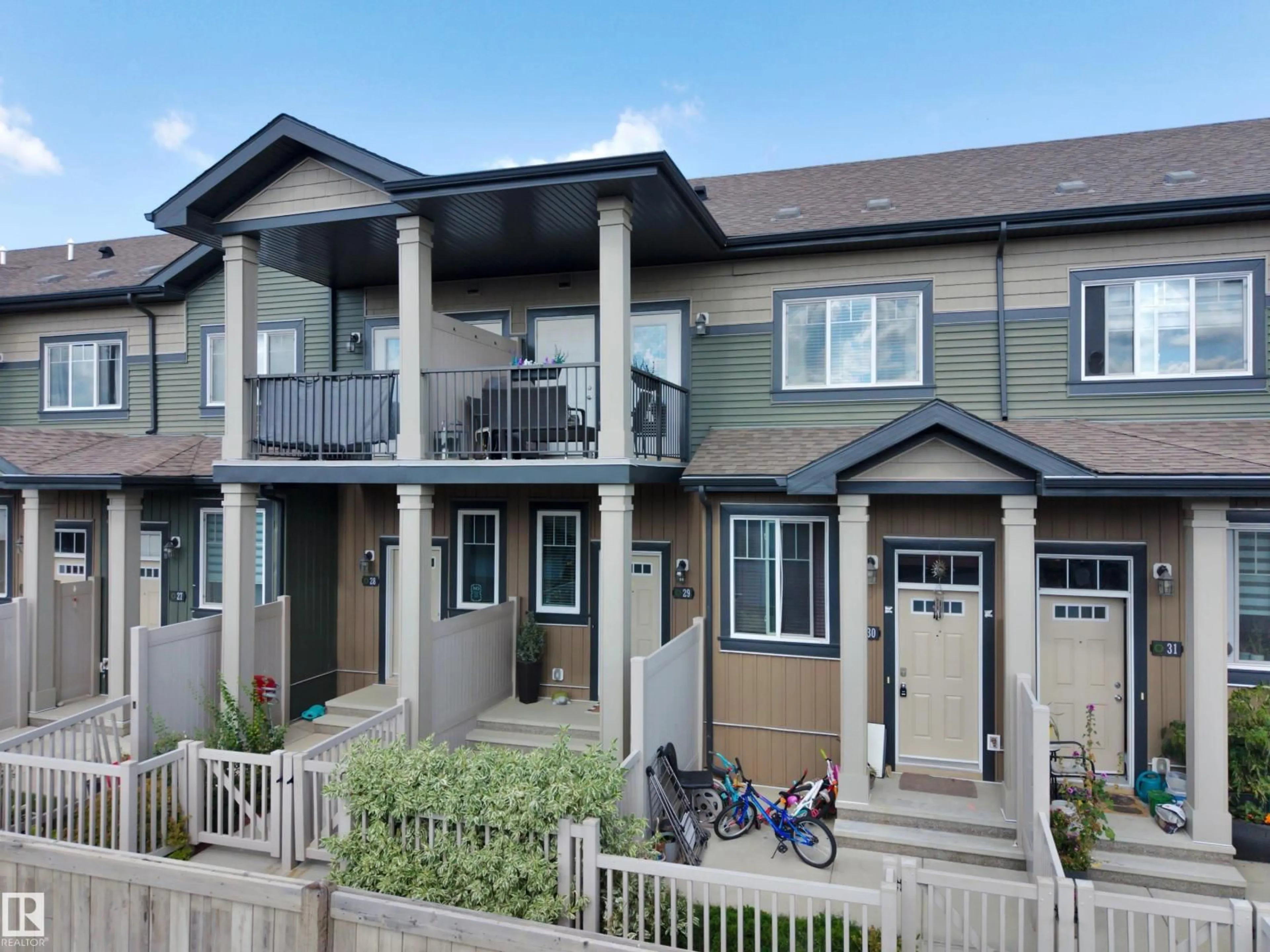 Home with vinyl exterior material, street for 3305 - 29 ORCHARDS LI SW, Edmonton Alberta T6X2H1
