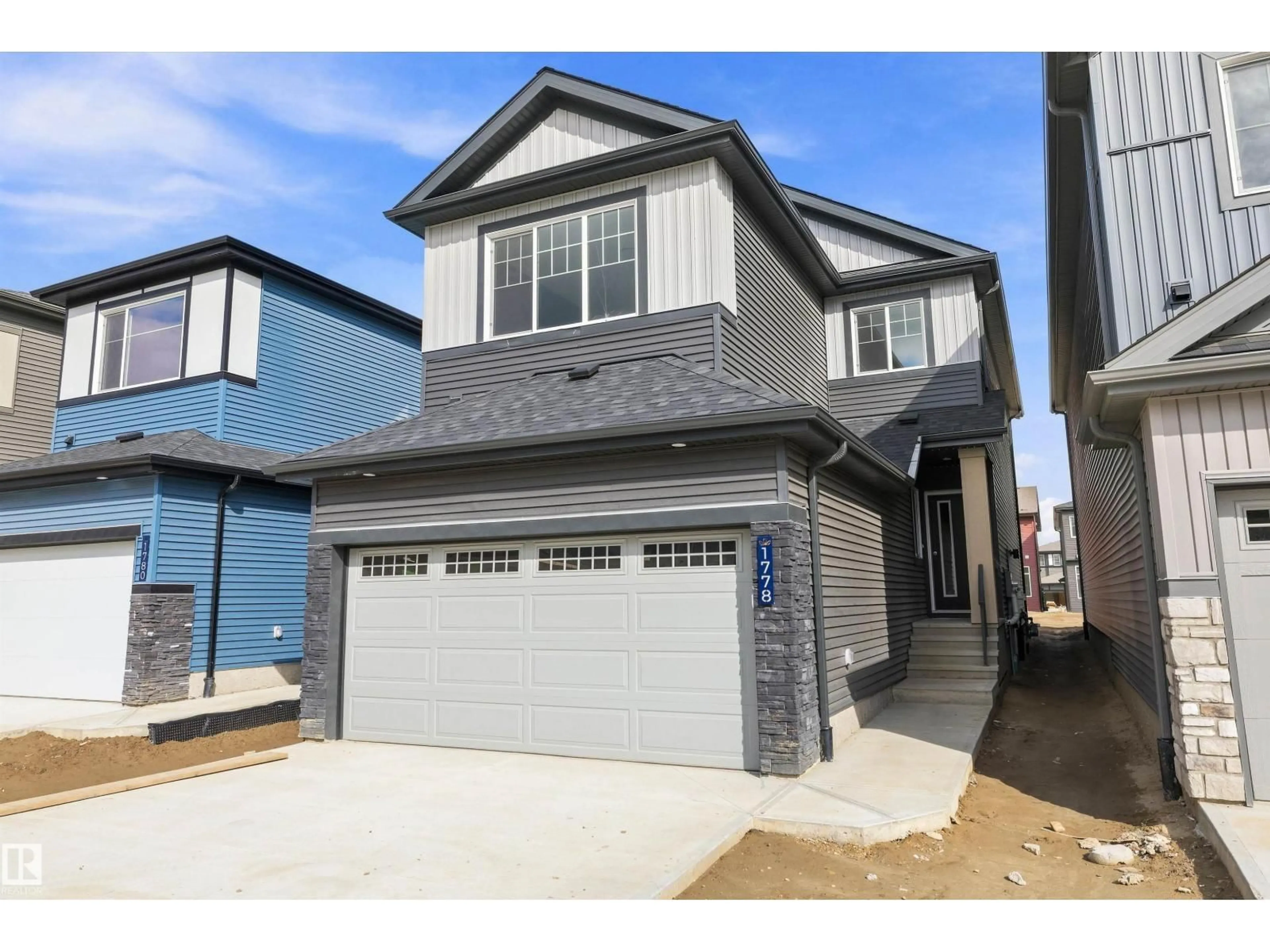 Home with vinyl exterior material, street for NW - 1778 CROSSBILL LO, Edmonton Alberta T5S0Y4