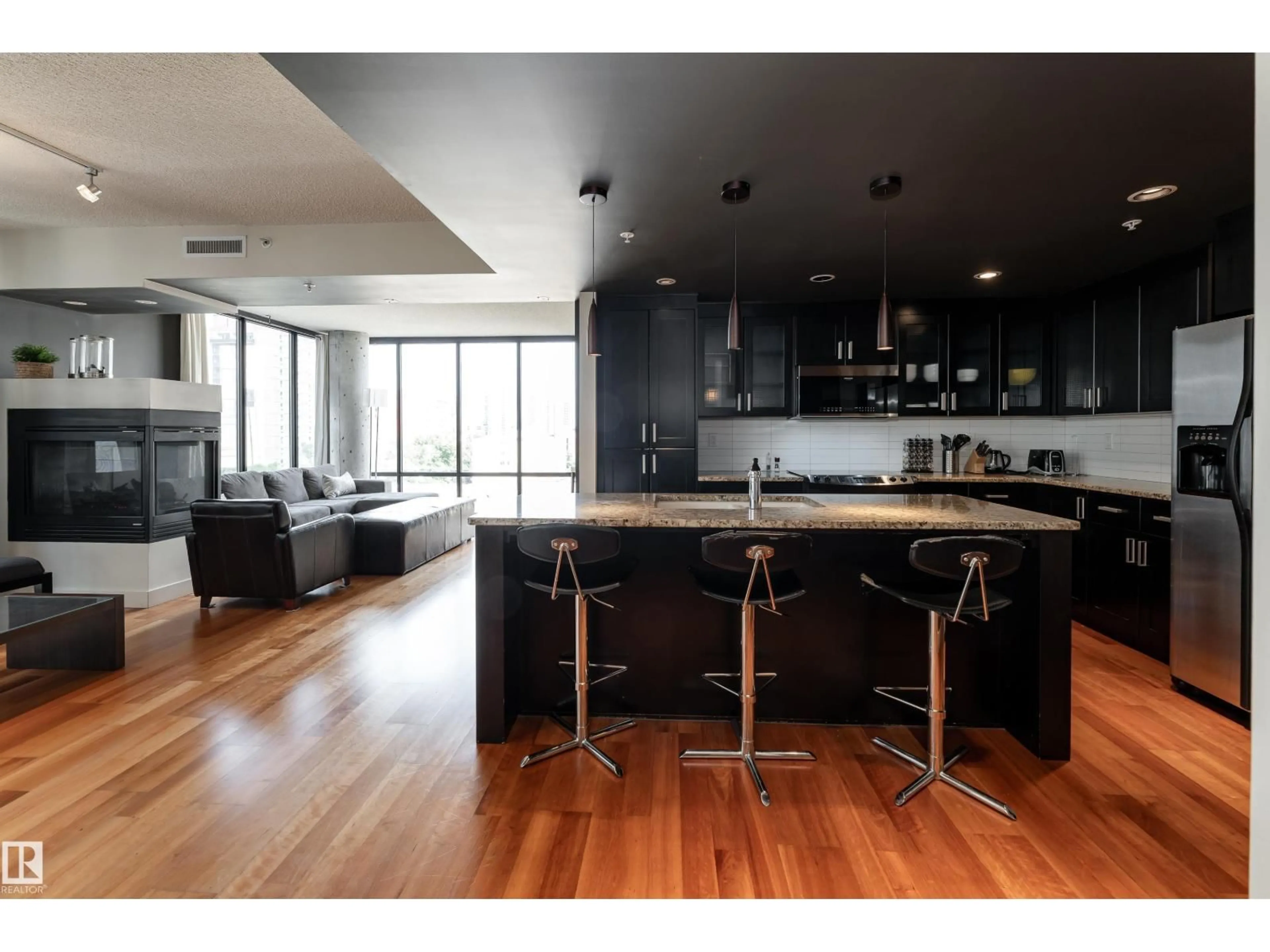 Open concept kitchen, wood/laminate floor for 10028 - 602 119 ST, Edmonton Alberta T5K1Y8