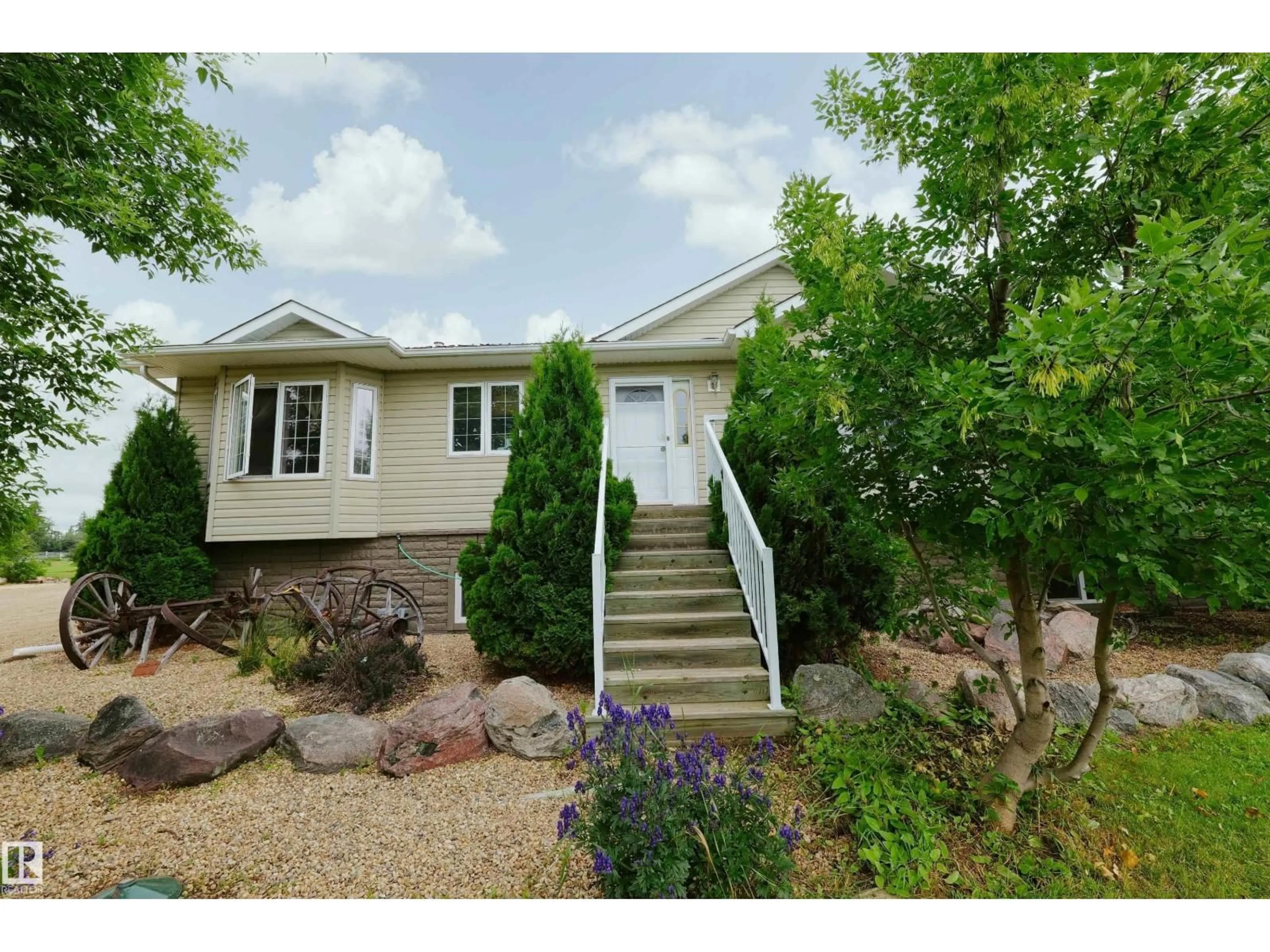 Home with vinyl exterior material, street for 6006 TWP RD 602, Rural Barrhead County Alberta T7N1N3