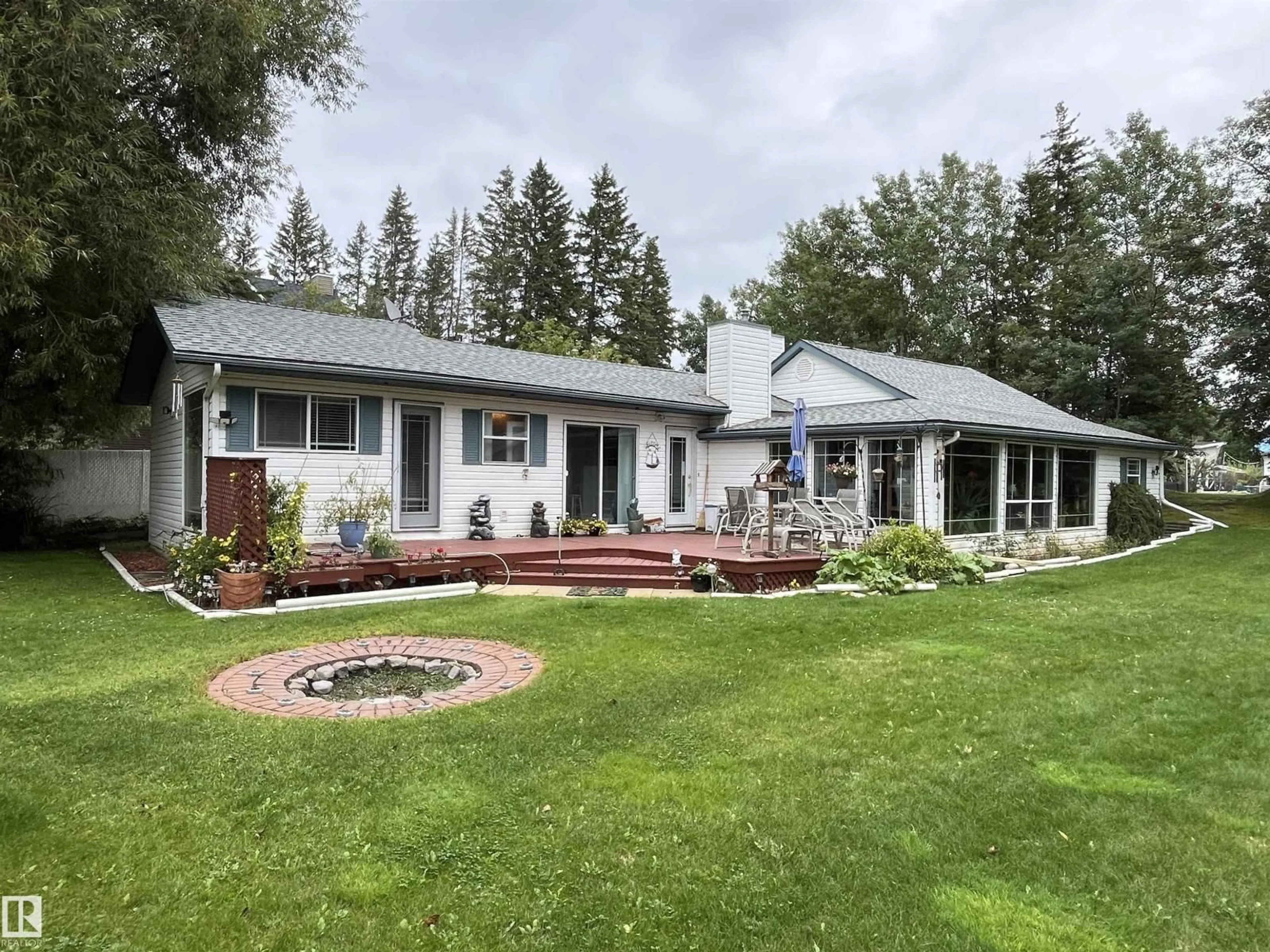 A pic from outside/outdoor area/front of a property/back of a property/a pic from drone, unknown for 5224 50 AV SE, Rural Lac Ste. Anne County Alberta T0E0A0