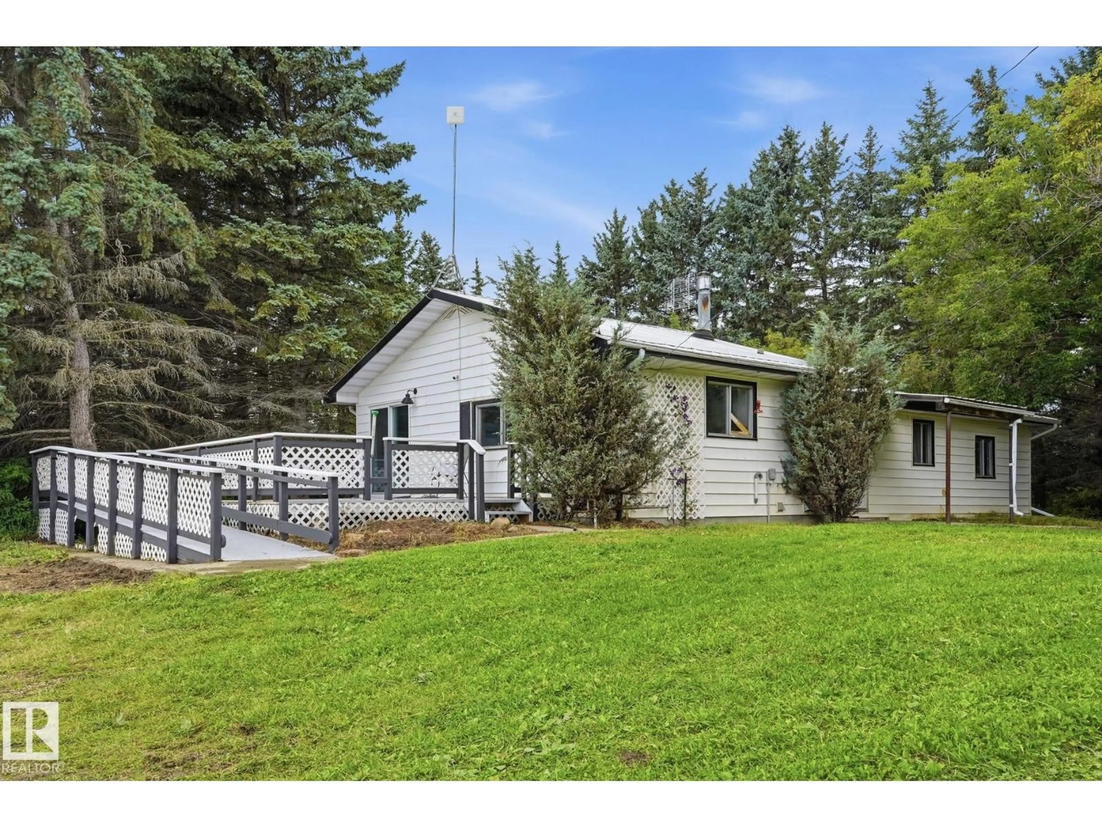 A pic from outside/outdoor area/front of a property/back of a property/a pic from drone, unknown for 53205 RGE ROAD 31, Rural Parkland County Alberta T7Y0E3