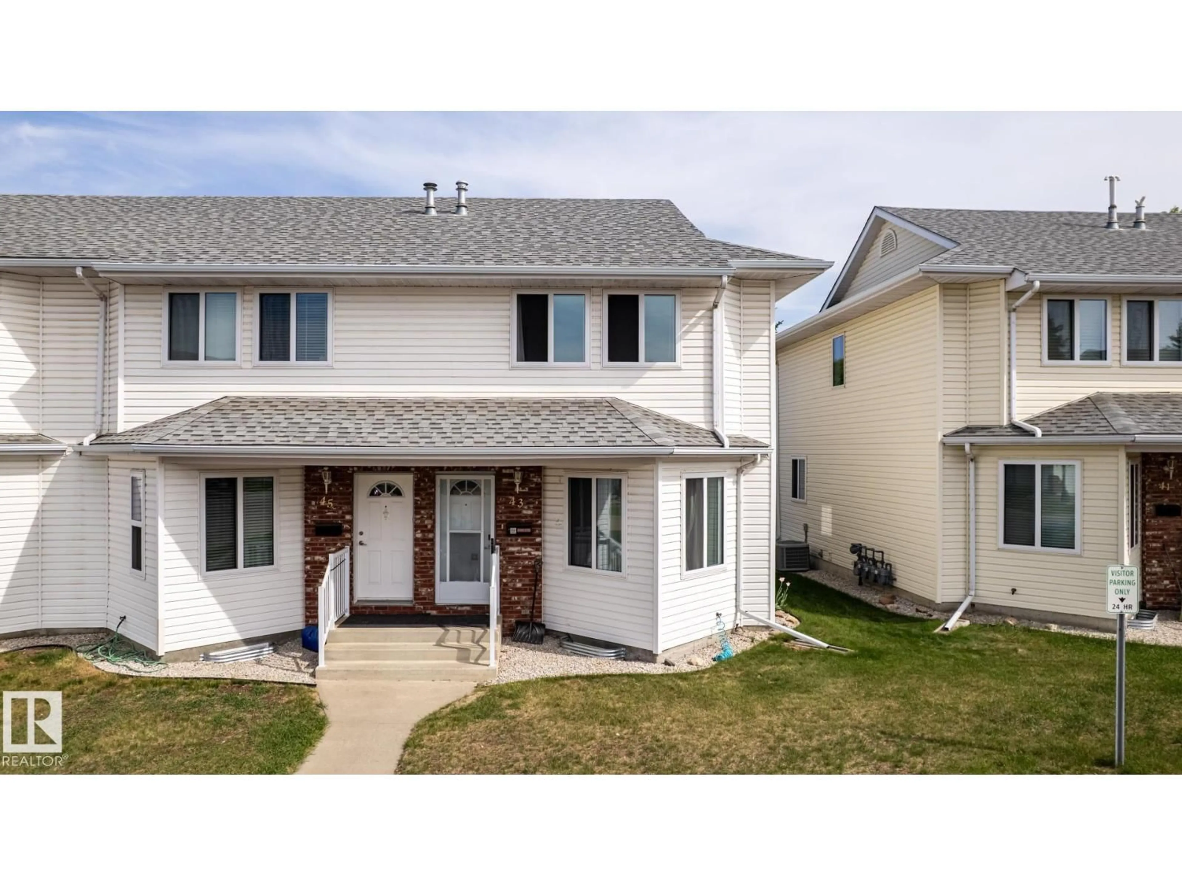 Home with vinyl exterior material, street for #43 - 1033 YOUVILLE DR, Edmonton Alberta T6L6V9