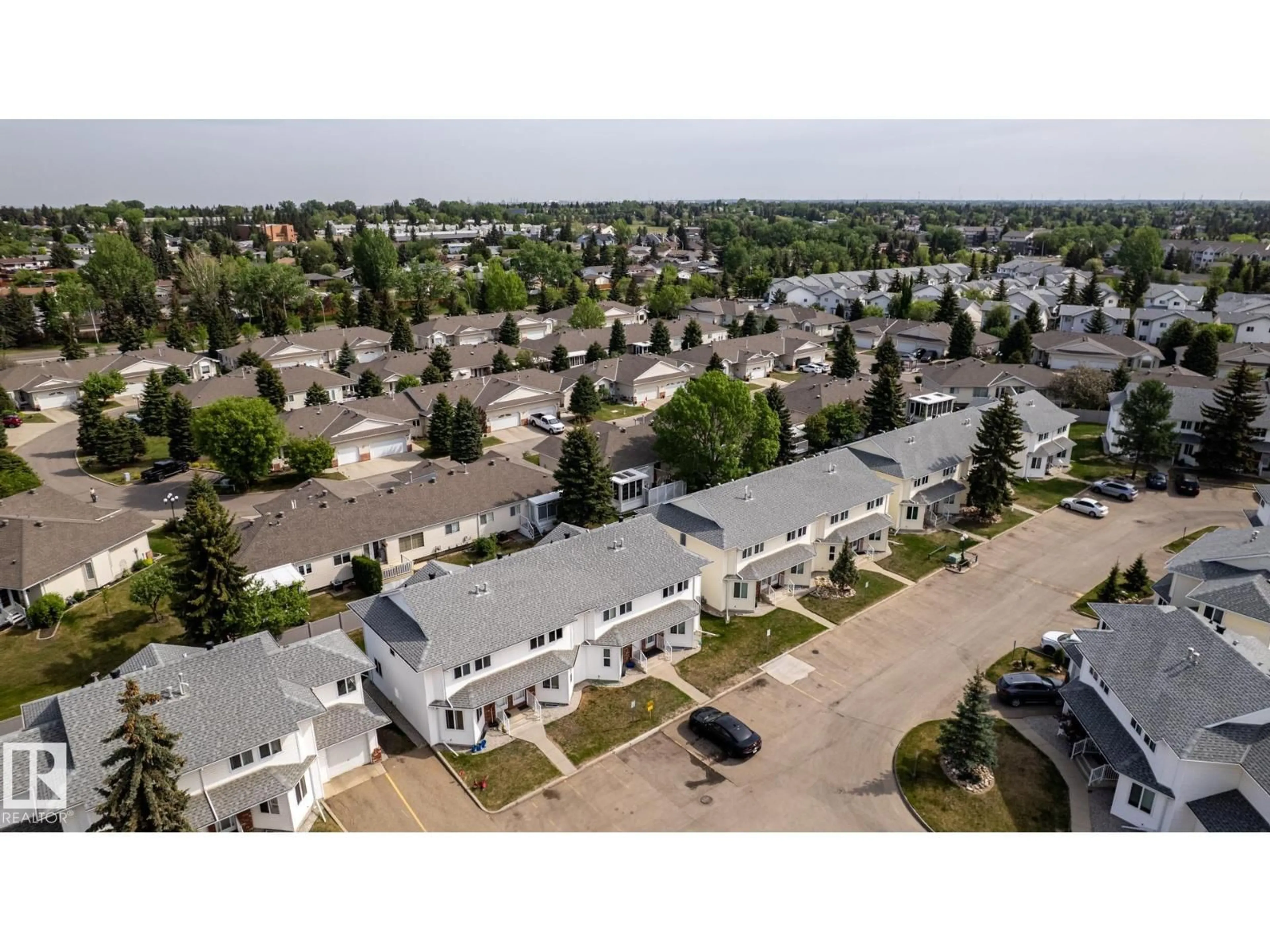 A pic from outside/outdoor area/front of a property/back of a property/a pic from drone, street for #43 - 1033 YOUVILLE DR, Edmonton Alberta T6L6V9