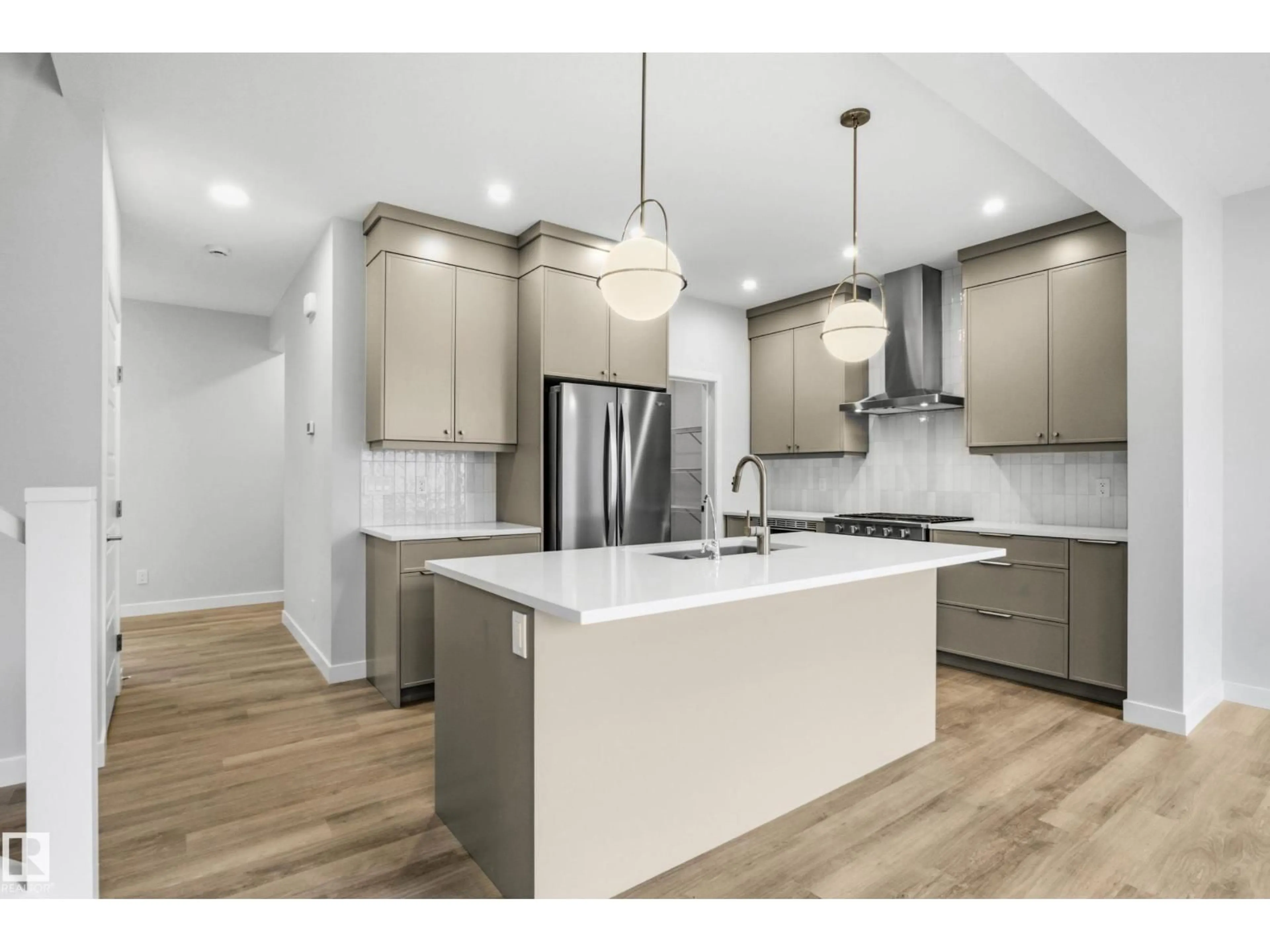 Open concept kitchen, unknown for 2372 MUCKLEPLUM WY, Edmonton Alberta T6X3K1