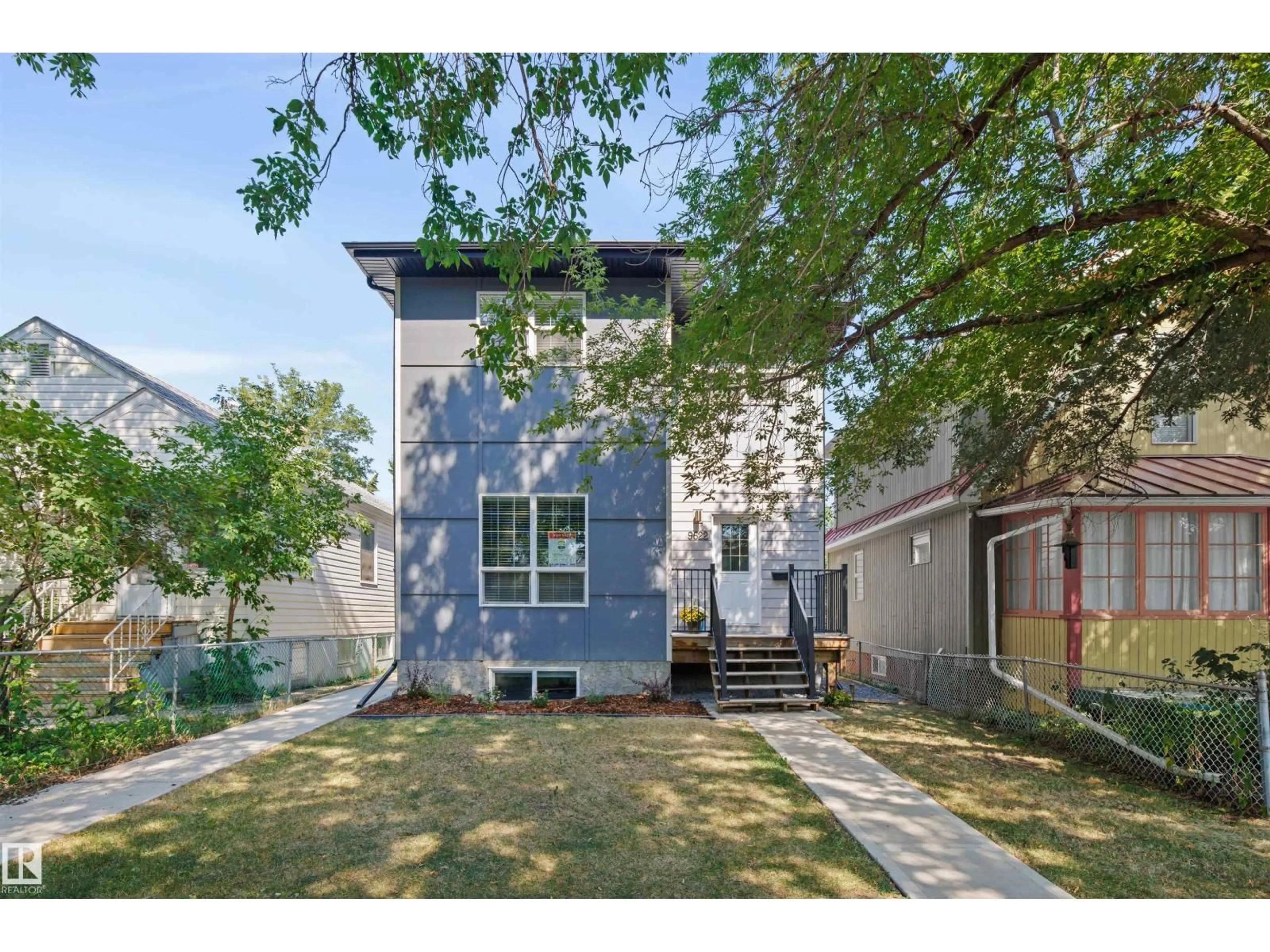 Home with vinyl exterior material, street for NW - 9622 77 AV, Edmonton Alberta T6C0M5
