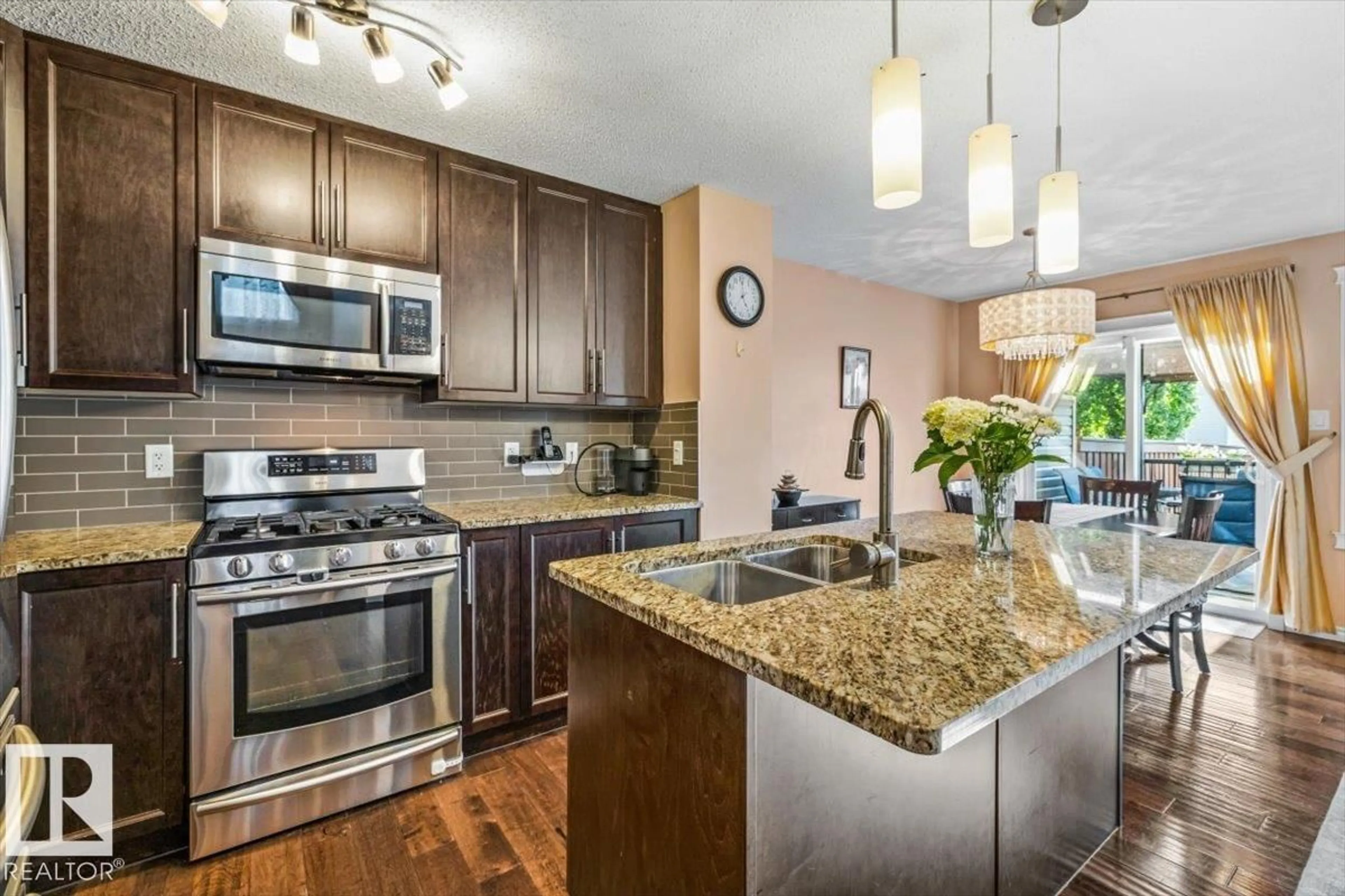Open concept kitchen, unknown for 9518 SIMPSON CO, Edmonton Alberta T6R0T8