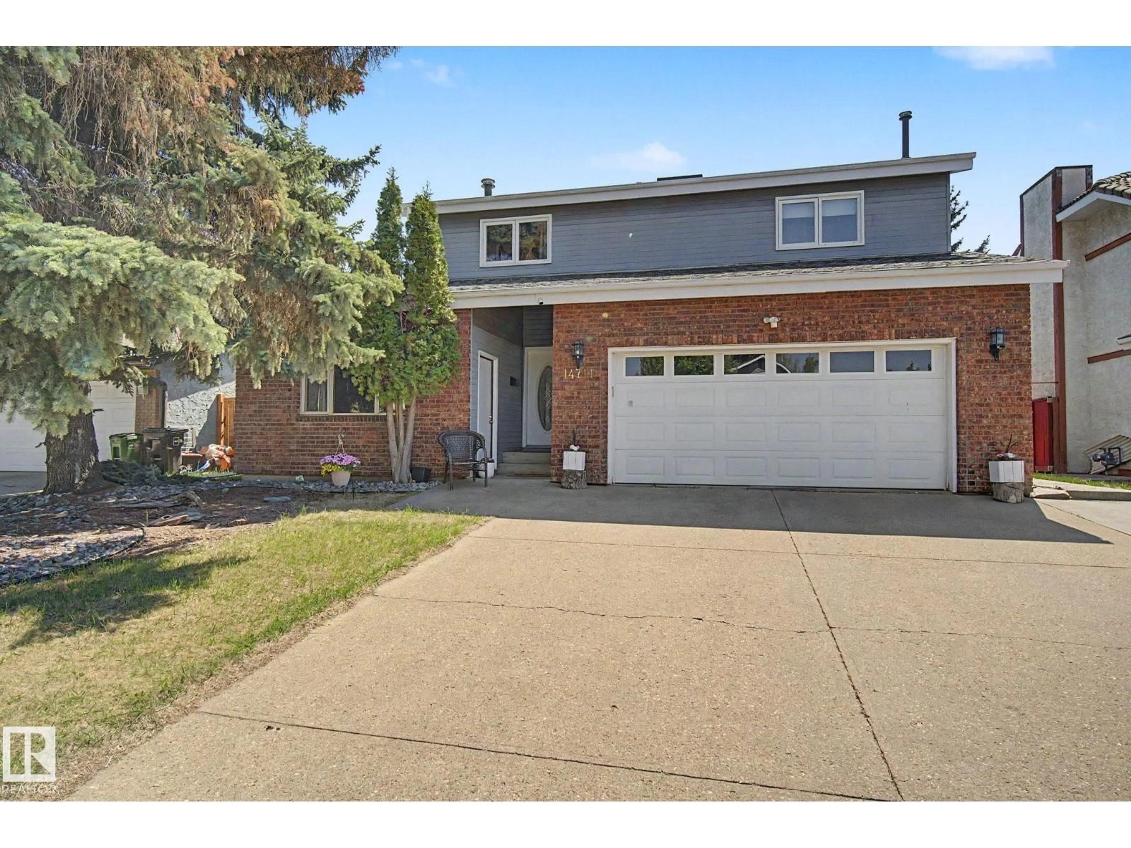 Home with brick exterior material, street for 14711 41 AV, Edmonton Alberta T6H5N6