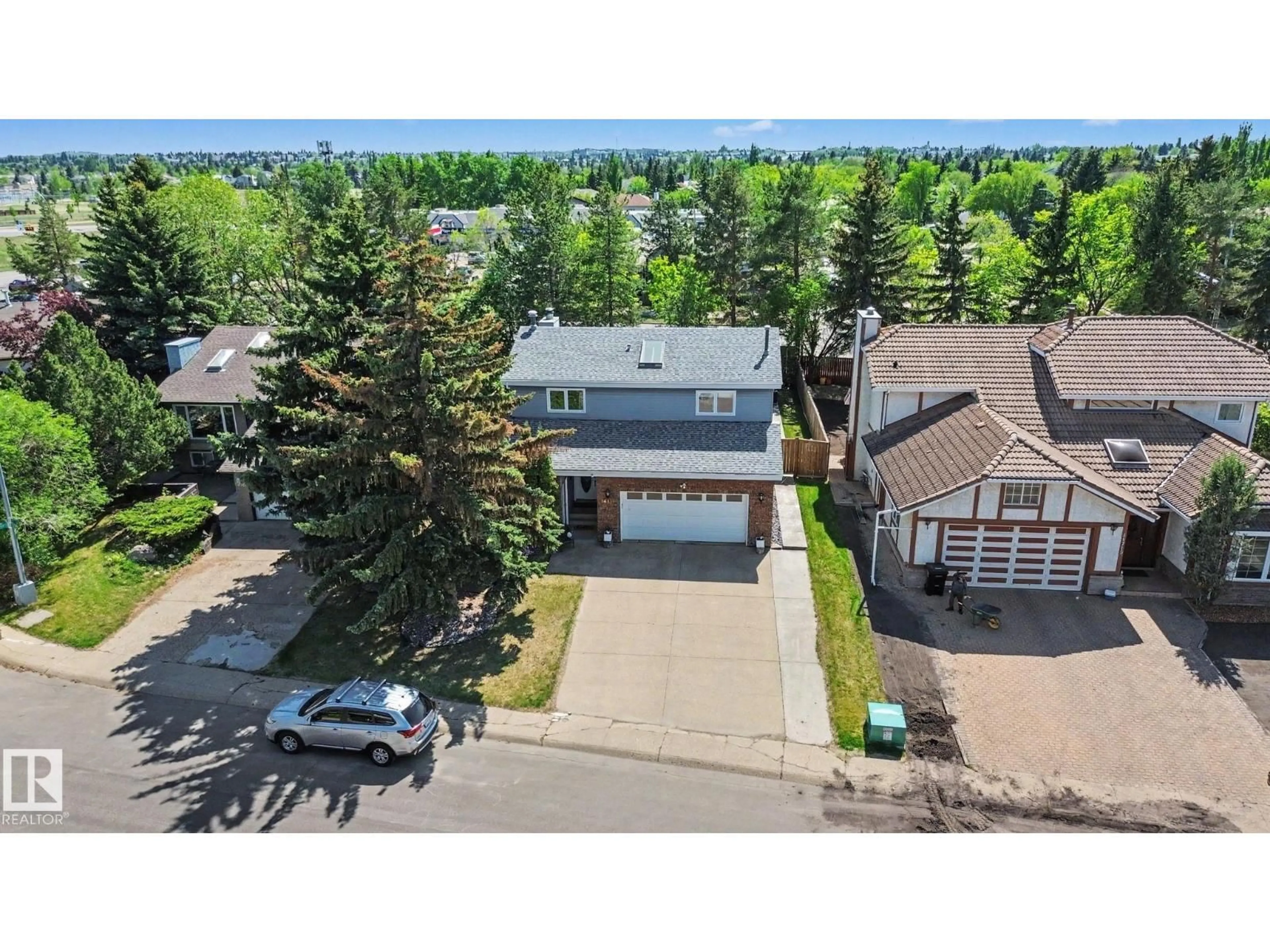 A pic from outside/outdoor area/front of a property/back of a property/a pic from drone, street for 14711 41 AV, Edmonton Alberta T6H5N6