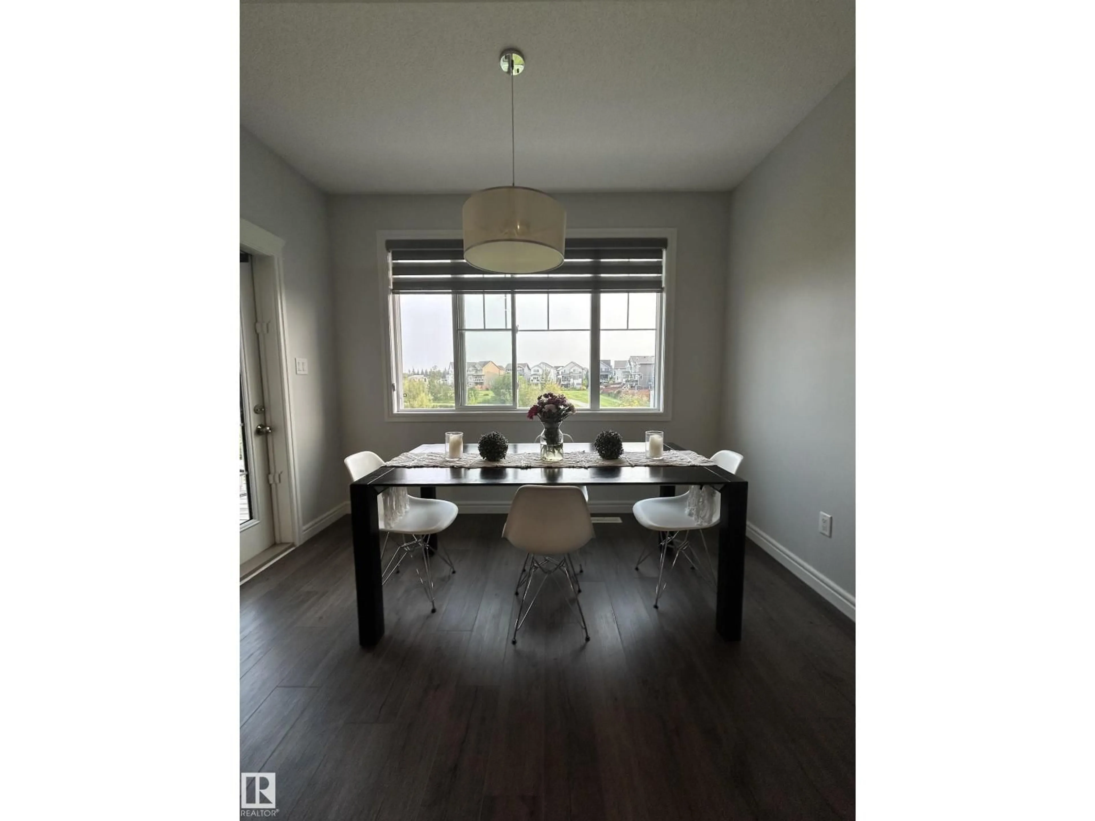 Dining room, wood/laminate floor for 104 JUNEAU WY, St. Albert Alberta T8N7V6