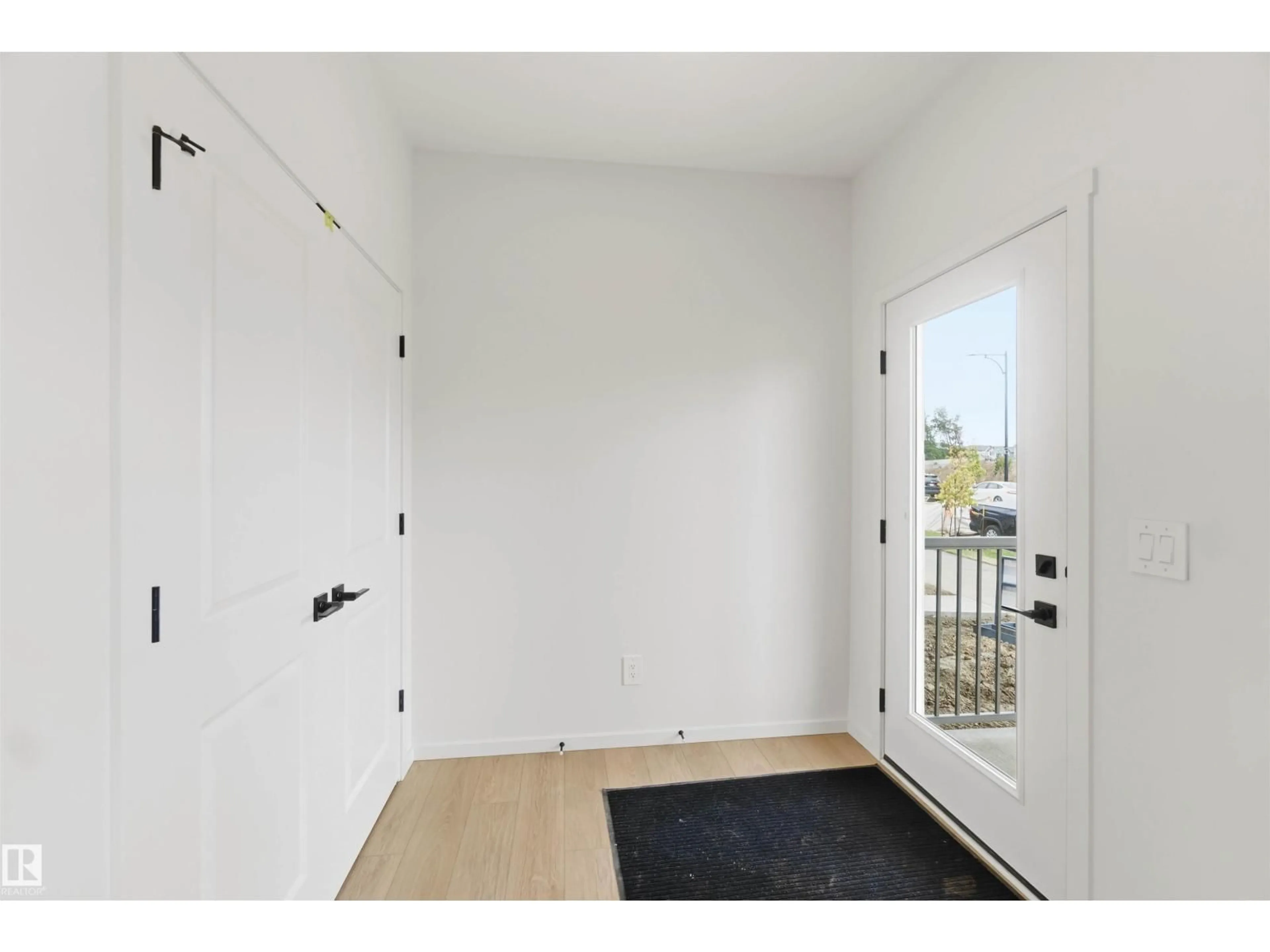 Indoor entryway for NW NW - 8816 EDGEMONT LI, Edmonton Alberta T6M3K8