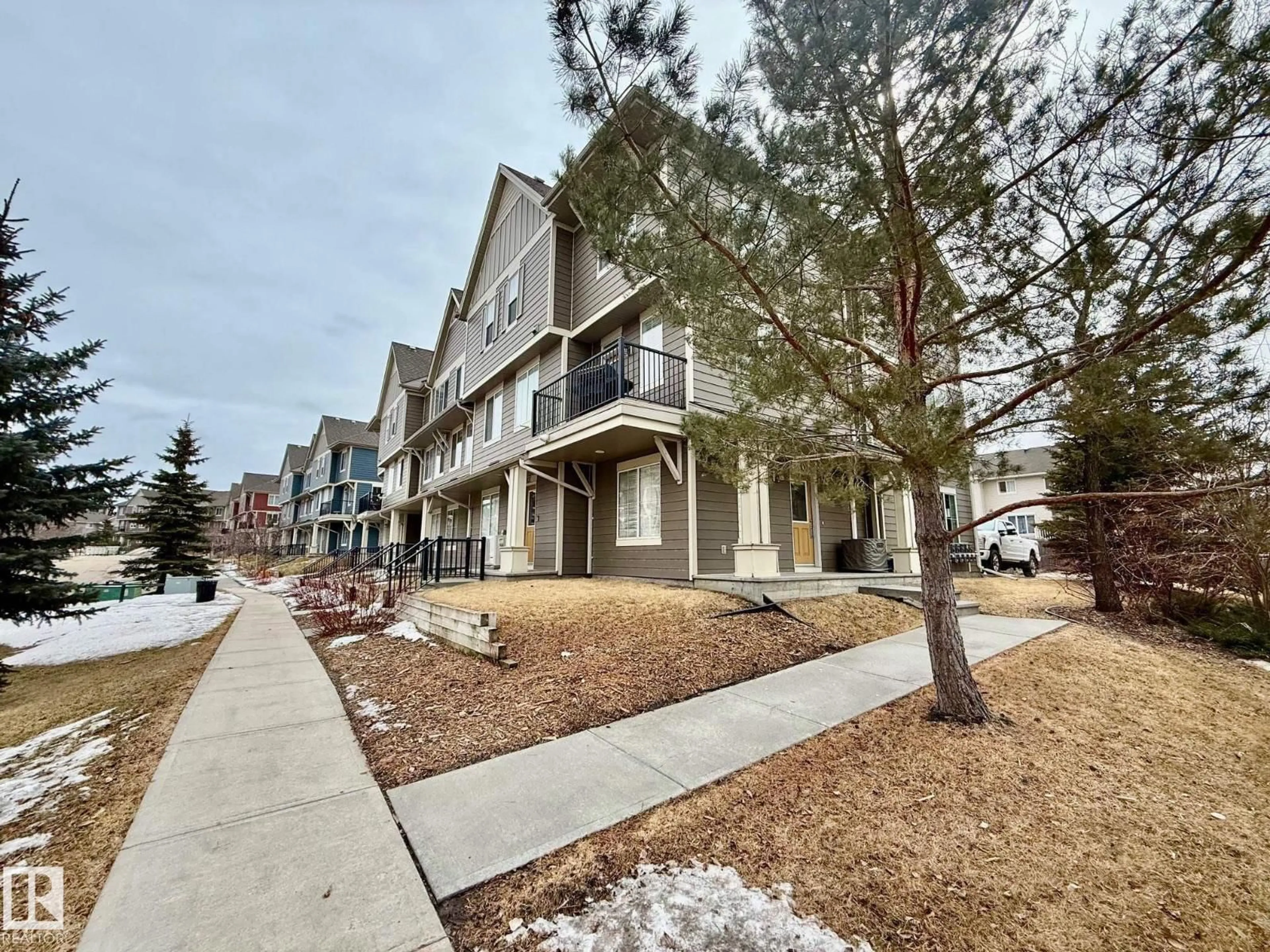 A pic from outside/outdoor area/front of a property/back of a property/a pic from drone, street for #105 - 603 WATT BV, Edmonton Alberta T6X0P3