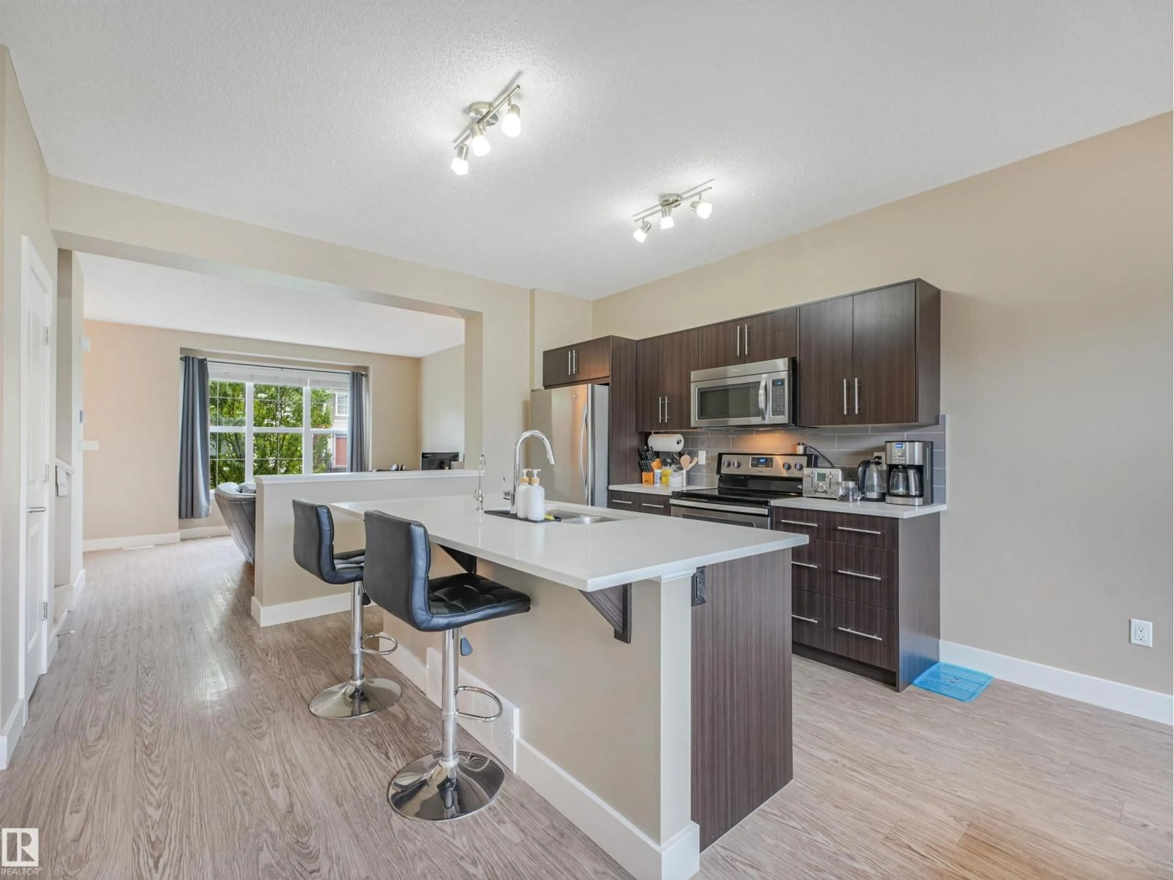 Open concept kitchen, unknown for NW - 2113 24 ST, Edmonton Alberta T6T0Y8