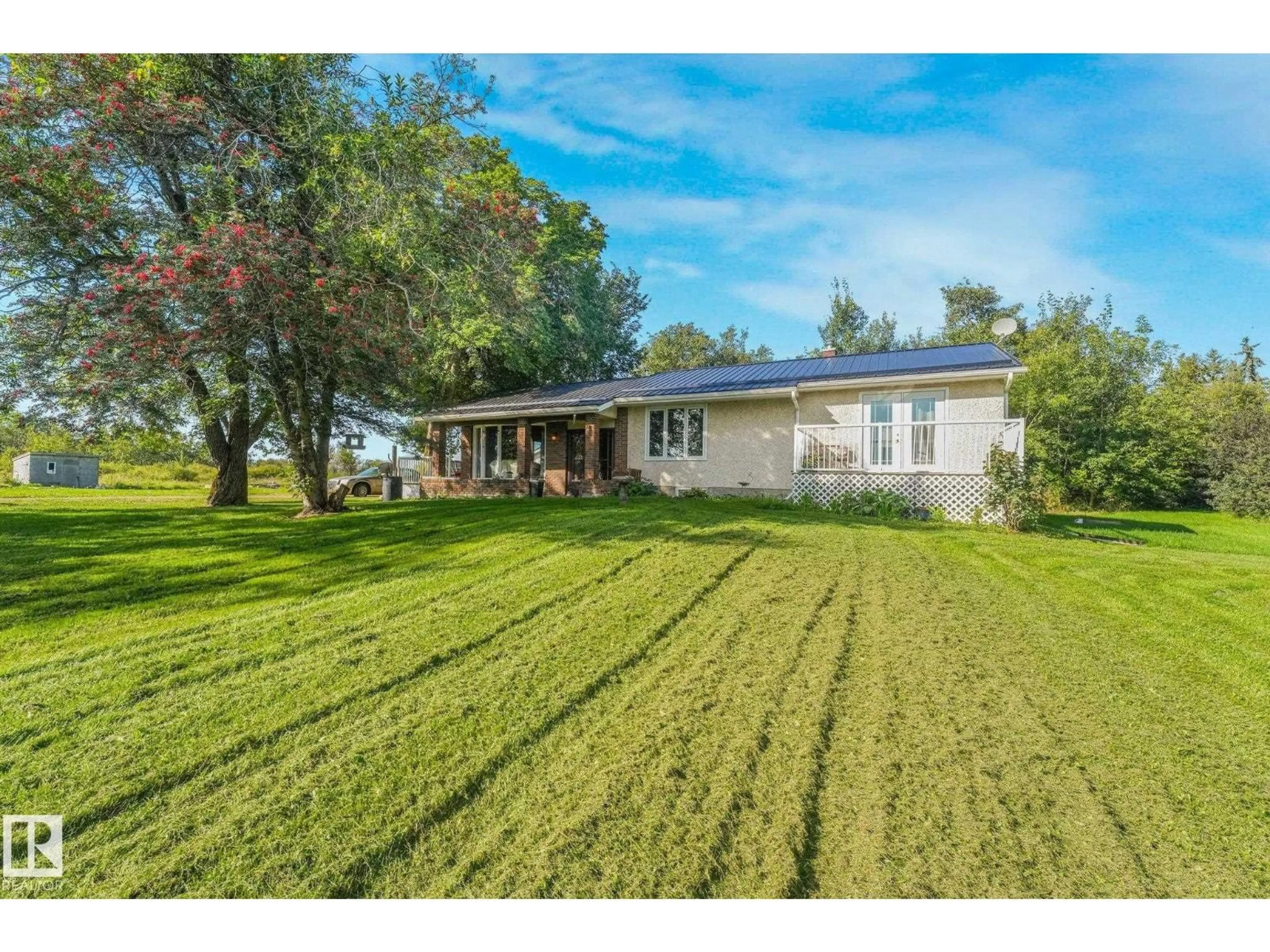 A pic from outside/outdoor area/front of a property/back of a property/a pic from drone, unknown for #2 - 57422 HWY 2, Rural Sturgeon County Alberta T0G1L0