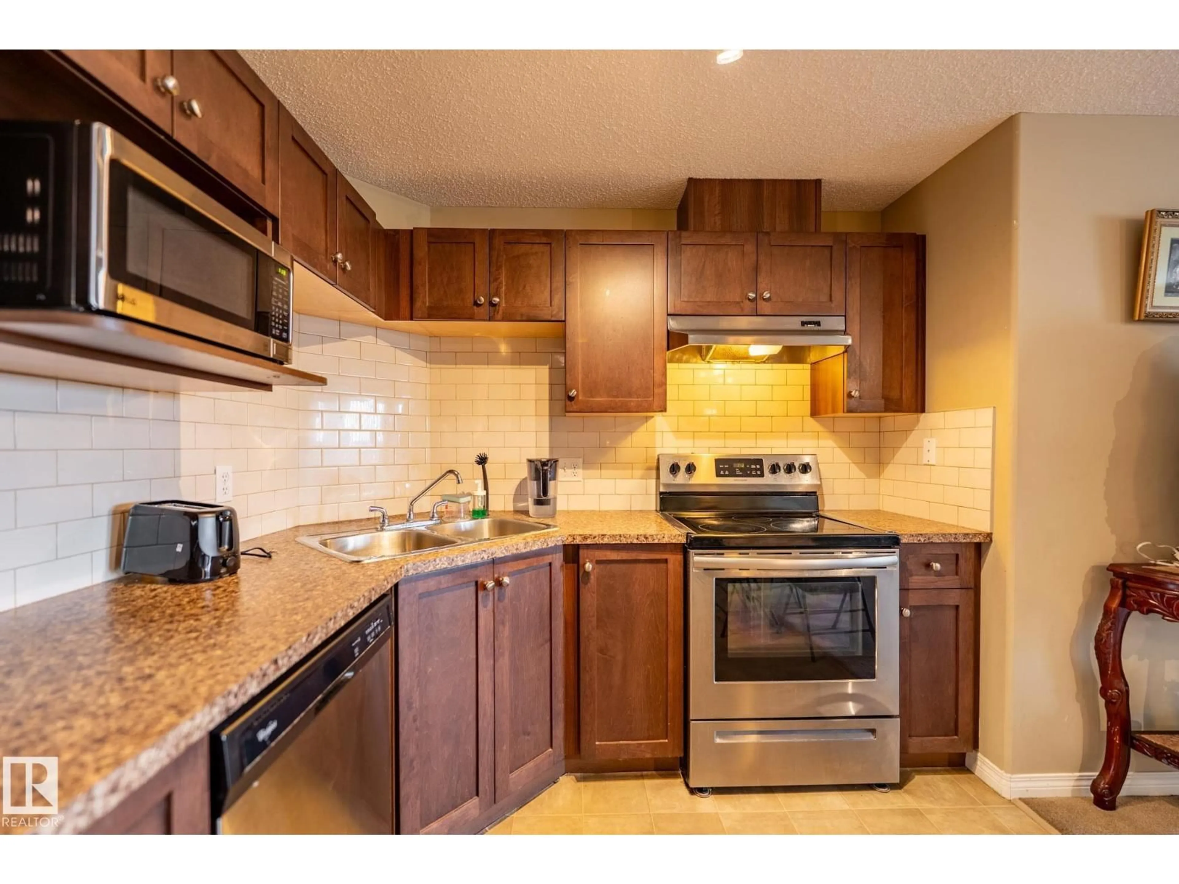 Standard kitchen, ceramic/tile floor for #320 - 1520 HAMMOND GA, Edmonton Alberta T6M0J4