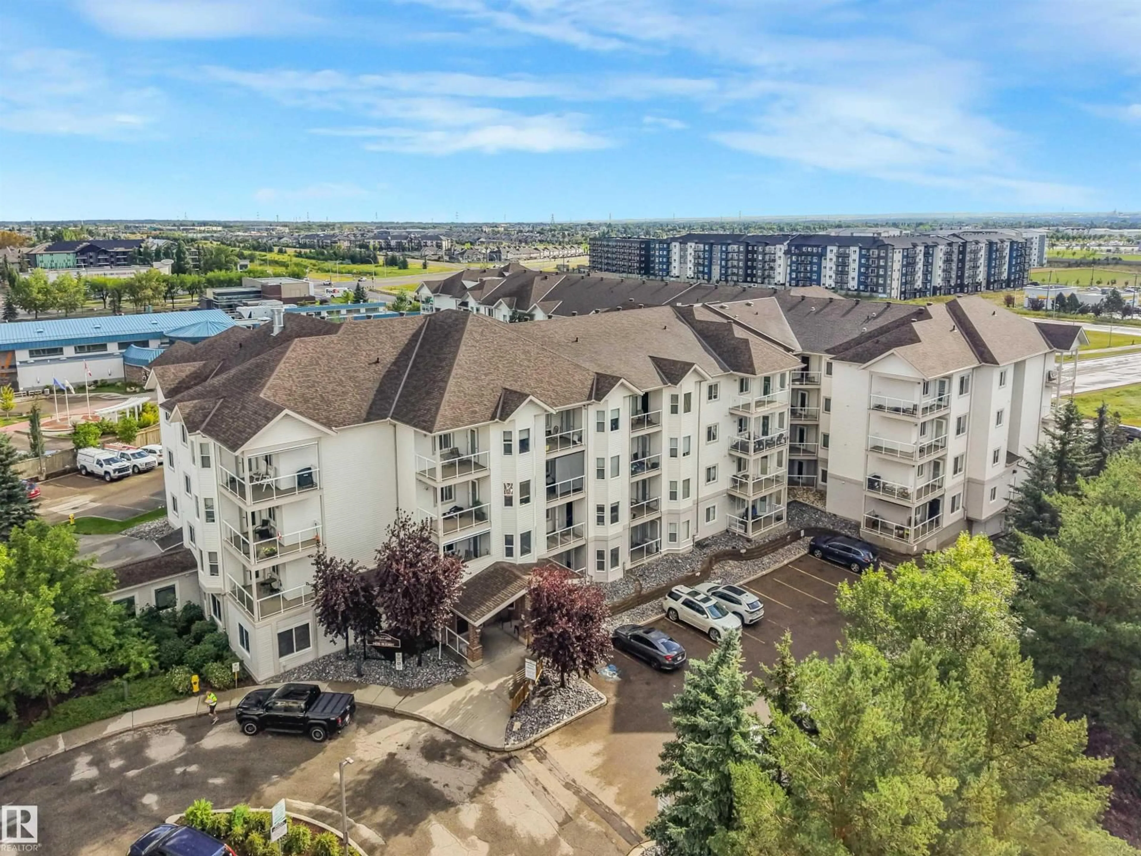 A pic from outside/outdoor area/front of a property/back of a property/a pic from drone, city buildings view from balcony for NW - 124 14259 50 ST, Edmonton Alberta T5A5J2