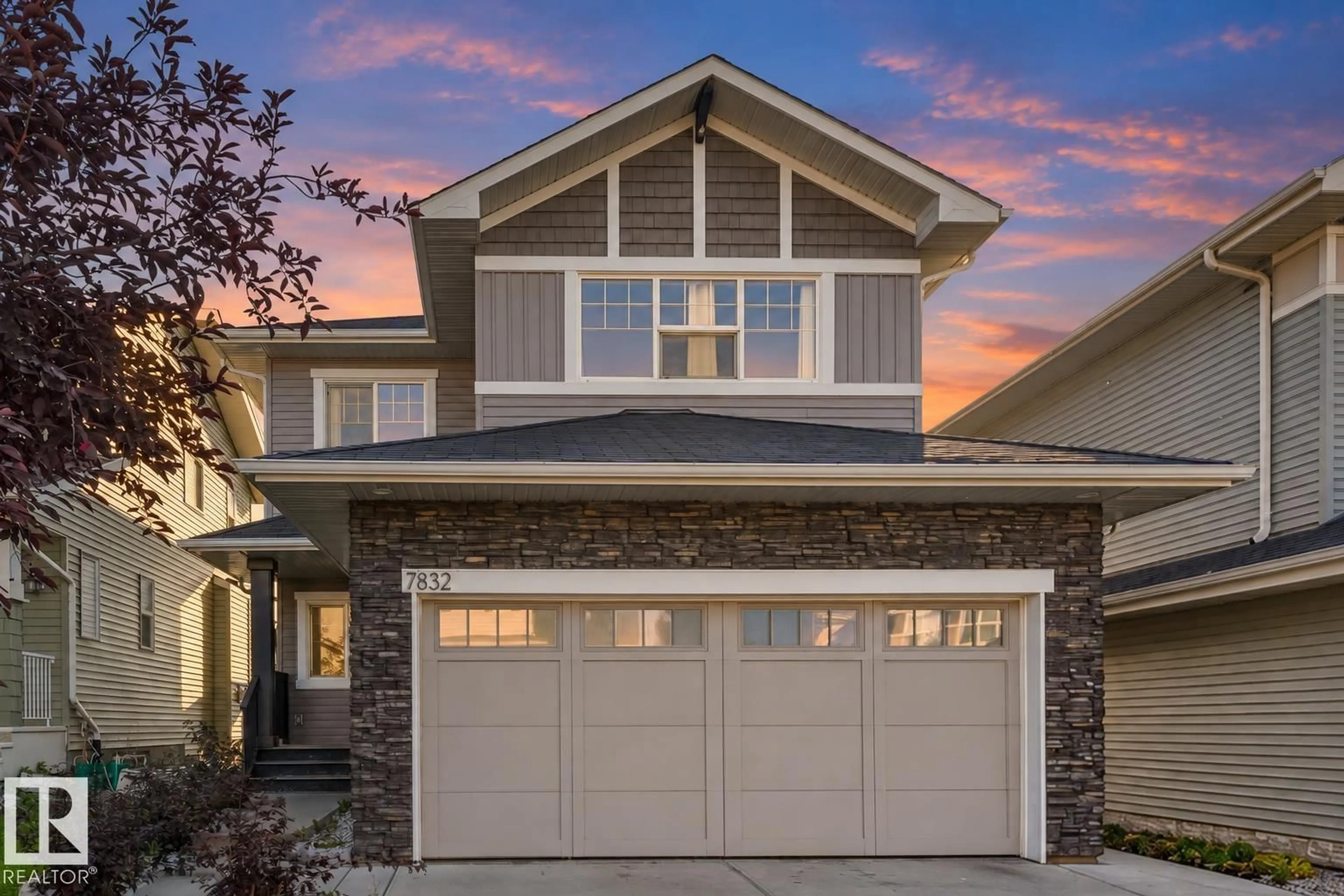 Home with vinyl exterior material, street for NW - 7832 ERASMUS WD, Edmonton Alberta T6M0S3
