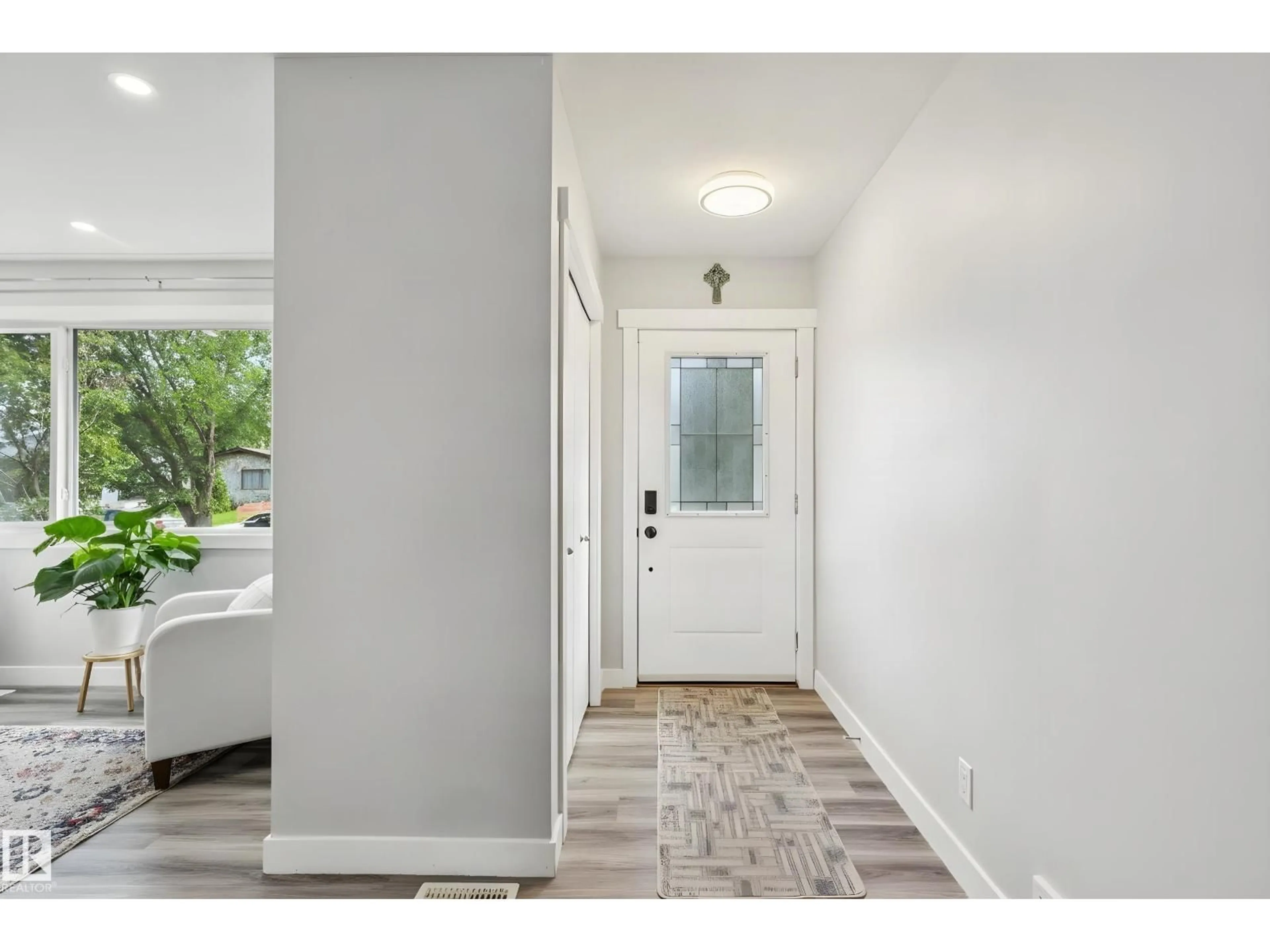 Indoor entryway for 13428 117A AV, Edmonton Alberta T5M3J7