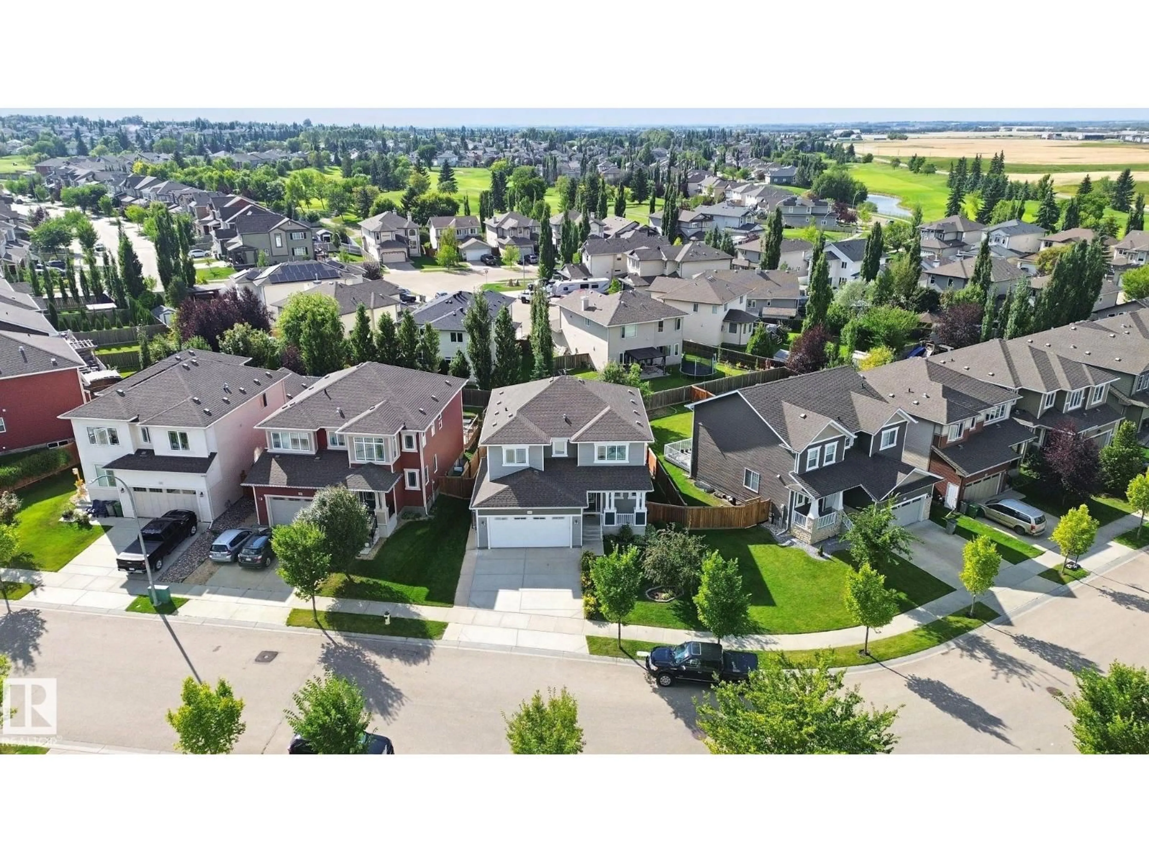A pic from outside/outdoor area/front of a property/back of a property/a pic from drone, street for 129 RIDEAU CR, Beaumont Alberta T4X1Z6
