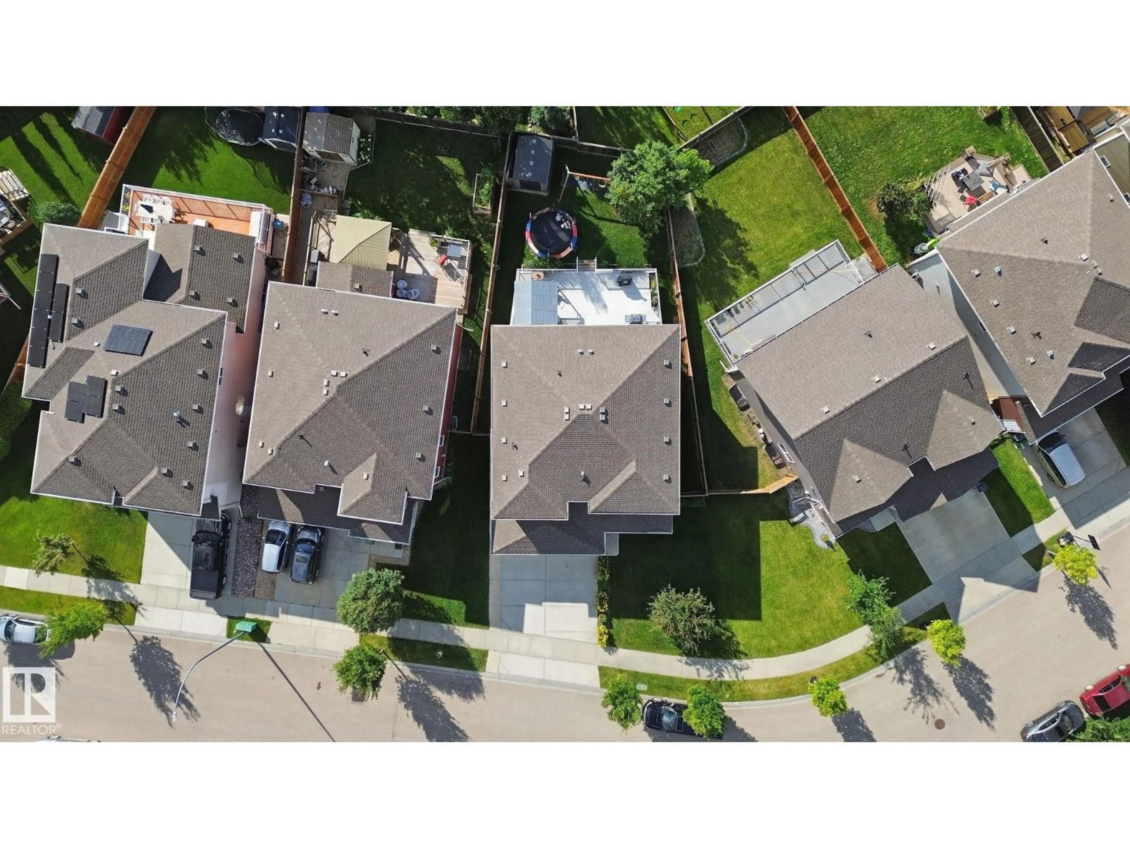 A pic from outside/outdoor area/front of a property/back of a property/a pic from drone, street for 129 RIDEAU CR, Beaumont Alberta T4X1Z6