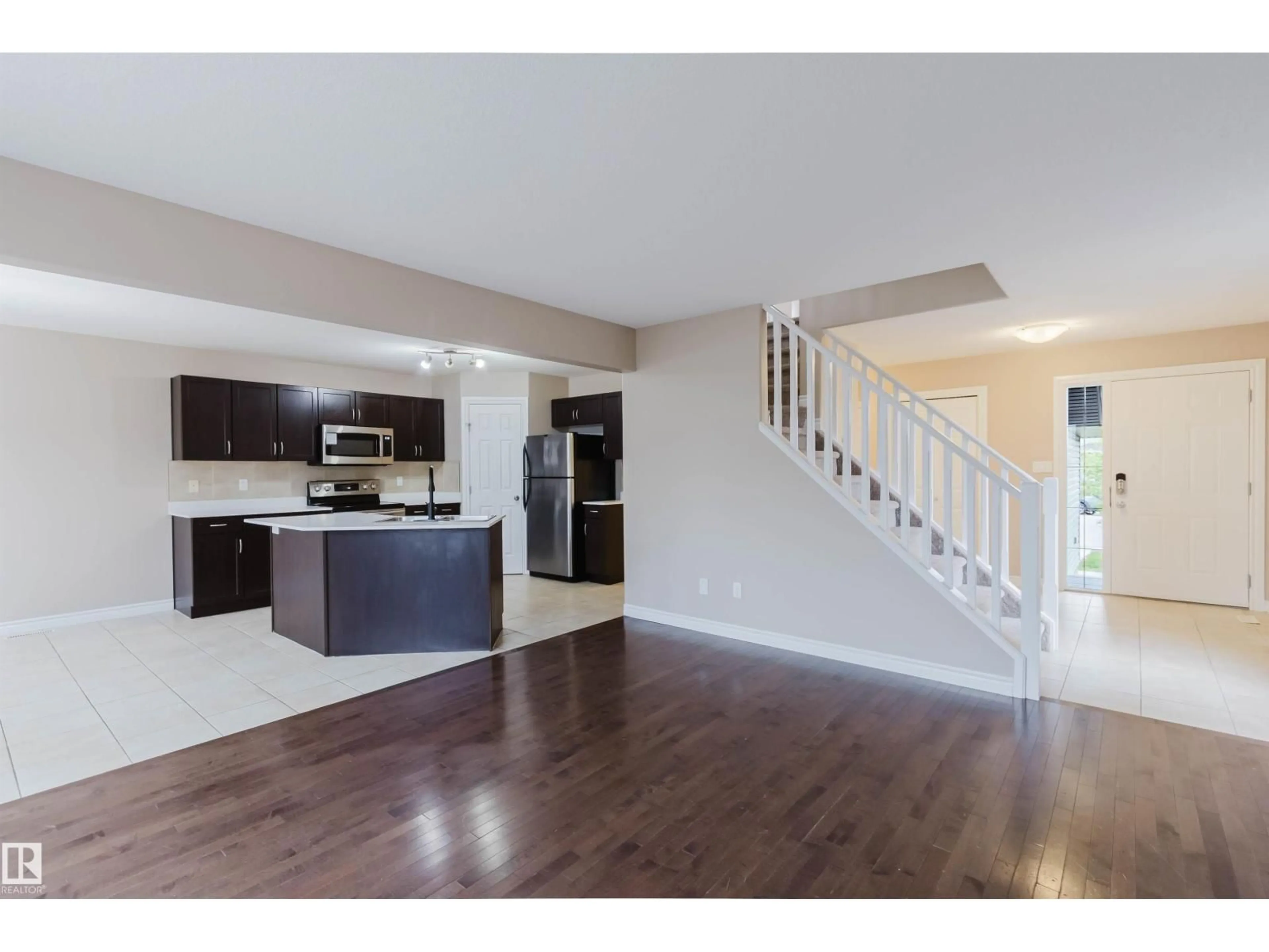 Open concept kitchen, unknown for 1919 HAMMOND PL, Edmonton Alberta T6M0K3