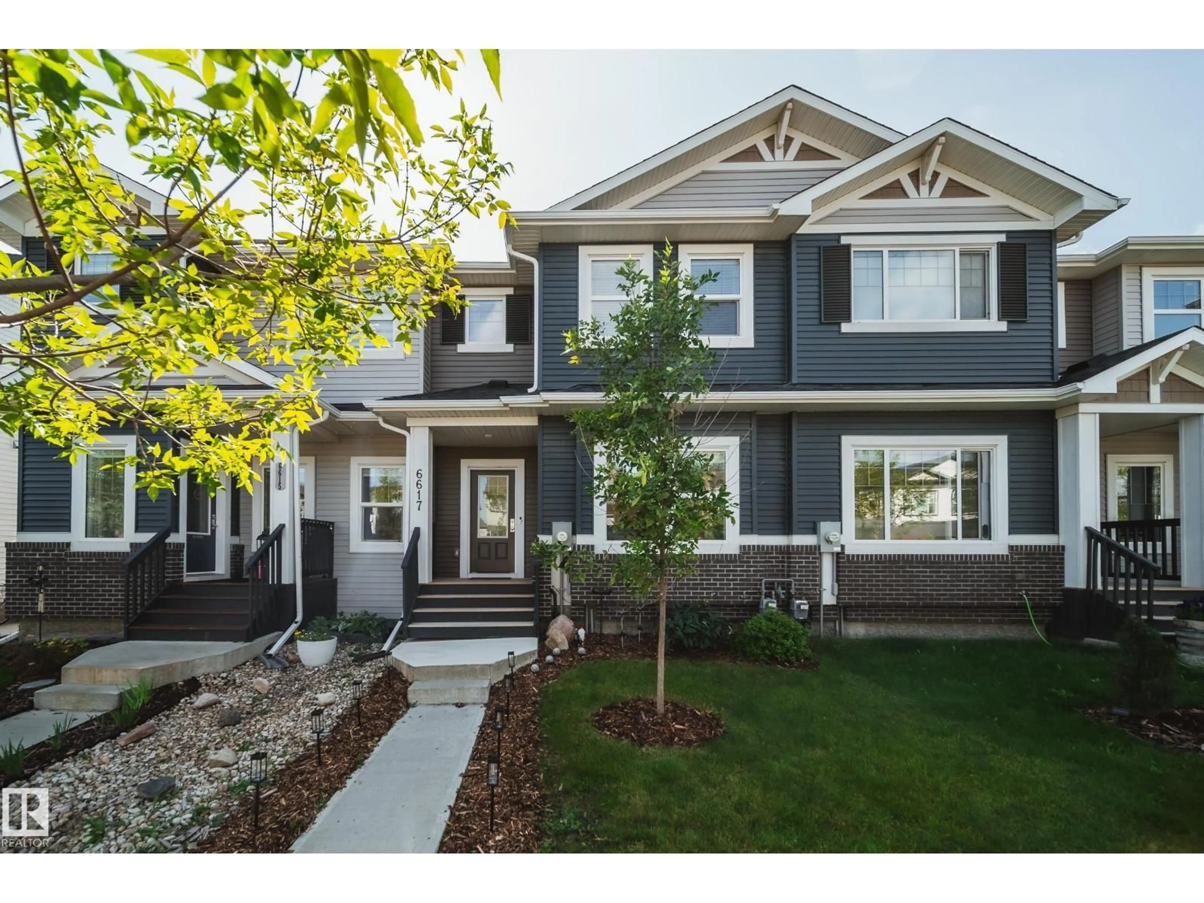Home with vinyl exterior material, street for 6617 47 AV, Beaumont Alberta T4X2X5