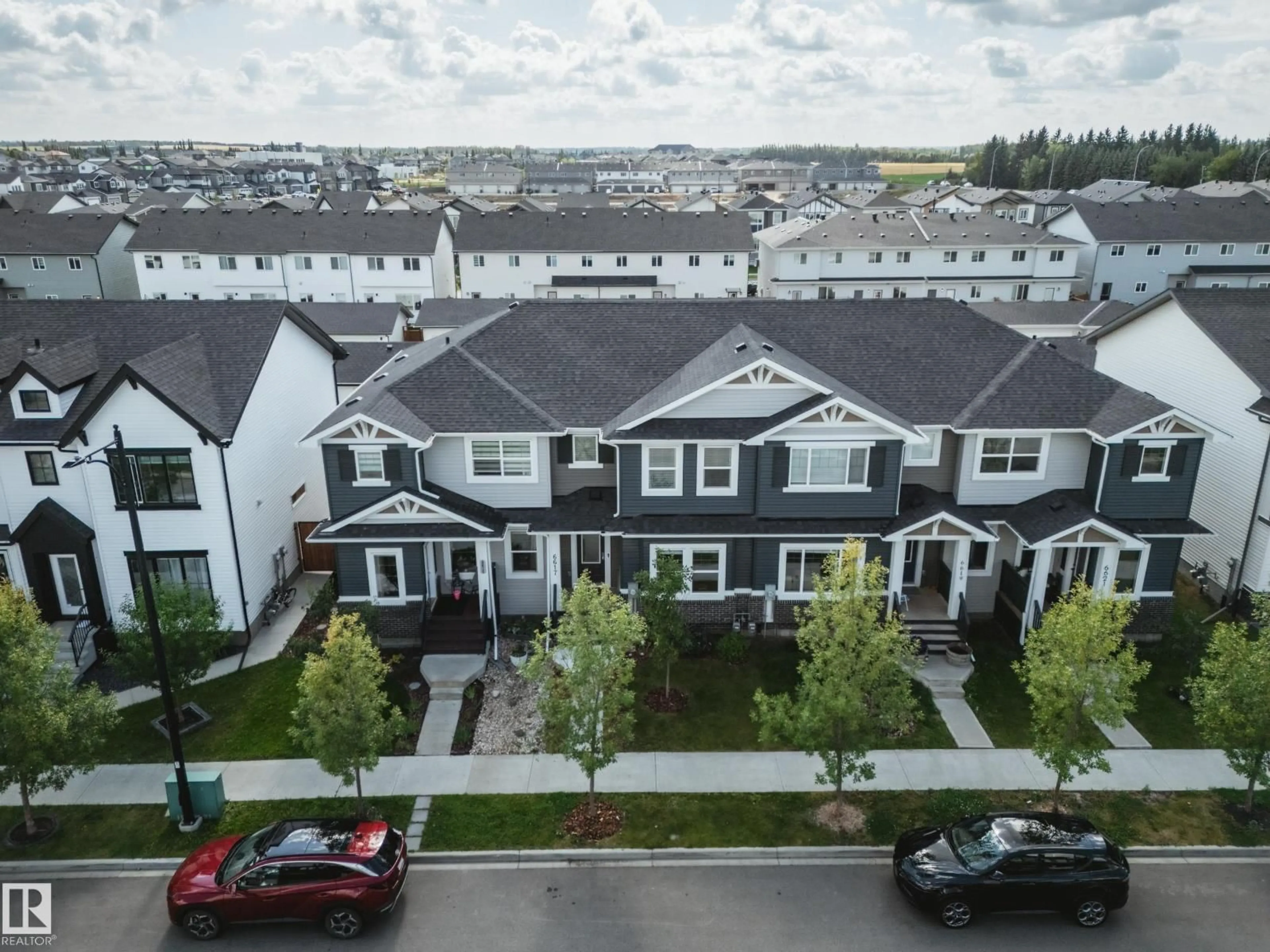 A pic from outside/outdoor area/front of a property/back of a property/a pic from drone, unknown for 6617 47 AV, Beaumont Alberta T4X2X5