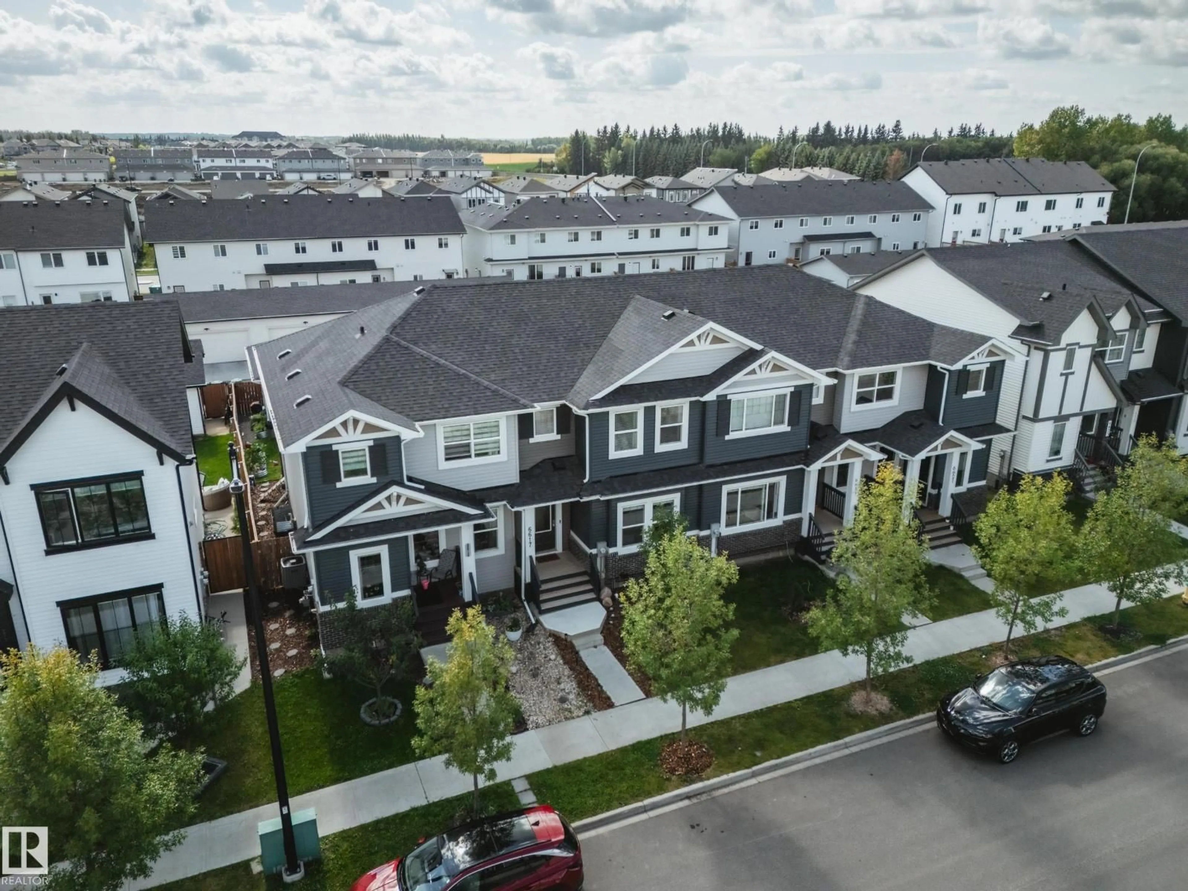 A pic from outside/outdoor area/front of a property/back of a property/a pic from drone, unknown for 6617 47 AV, Beaumont Alberta T4X2X5