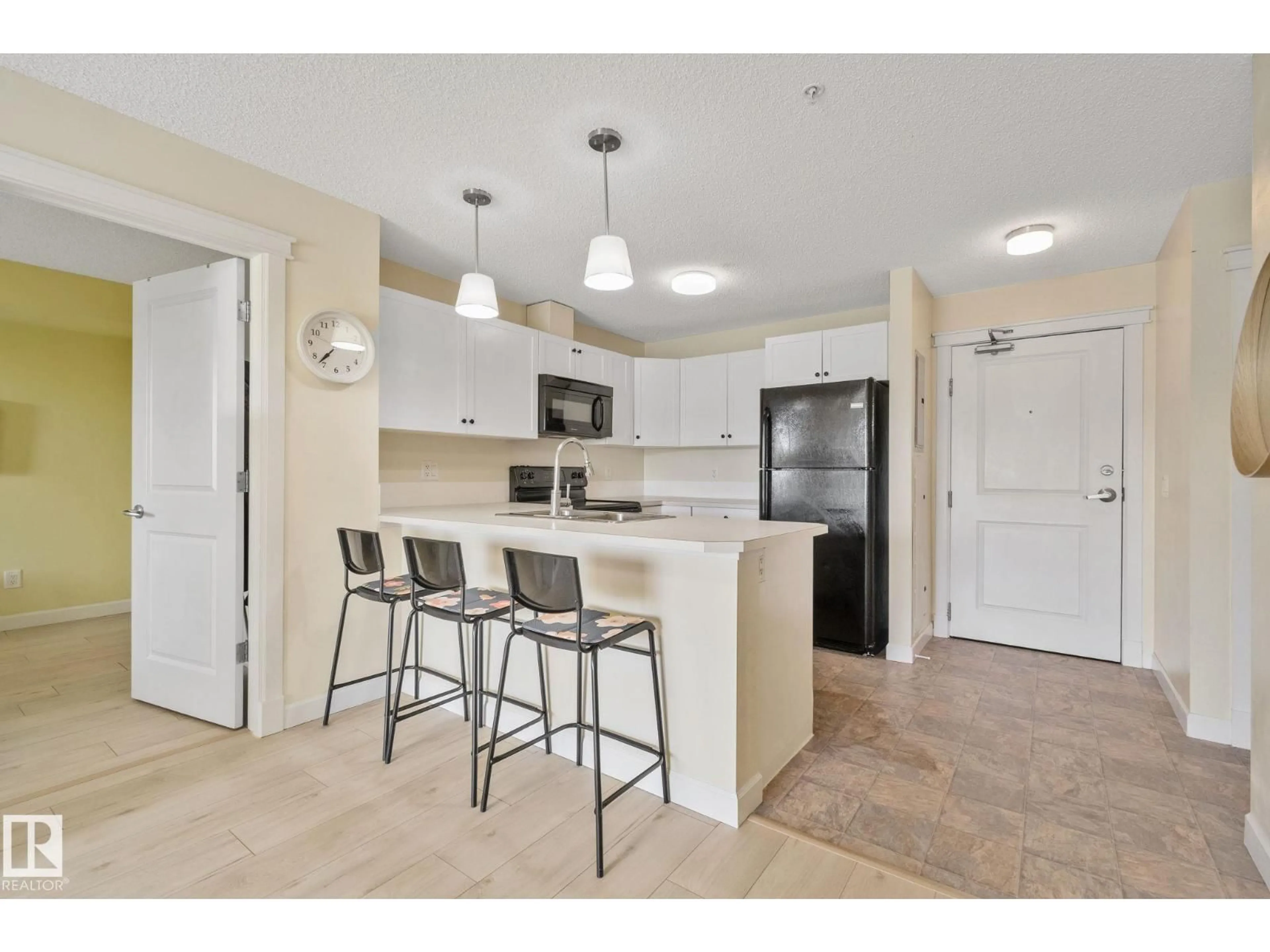 Open concept kitchen, unknown for #212 - 3715 WHITELAW LN, Edmonton Alberta T6W2C3