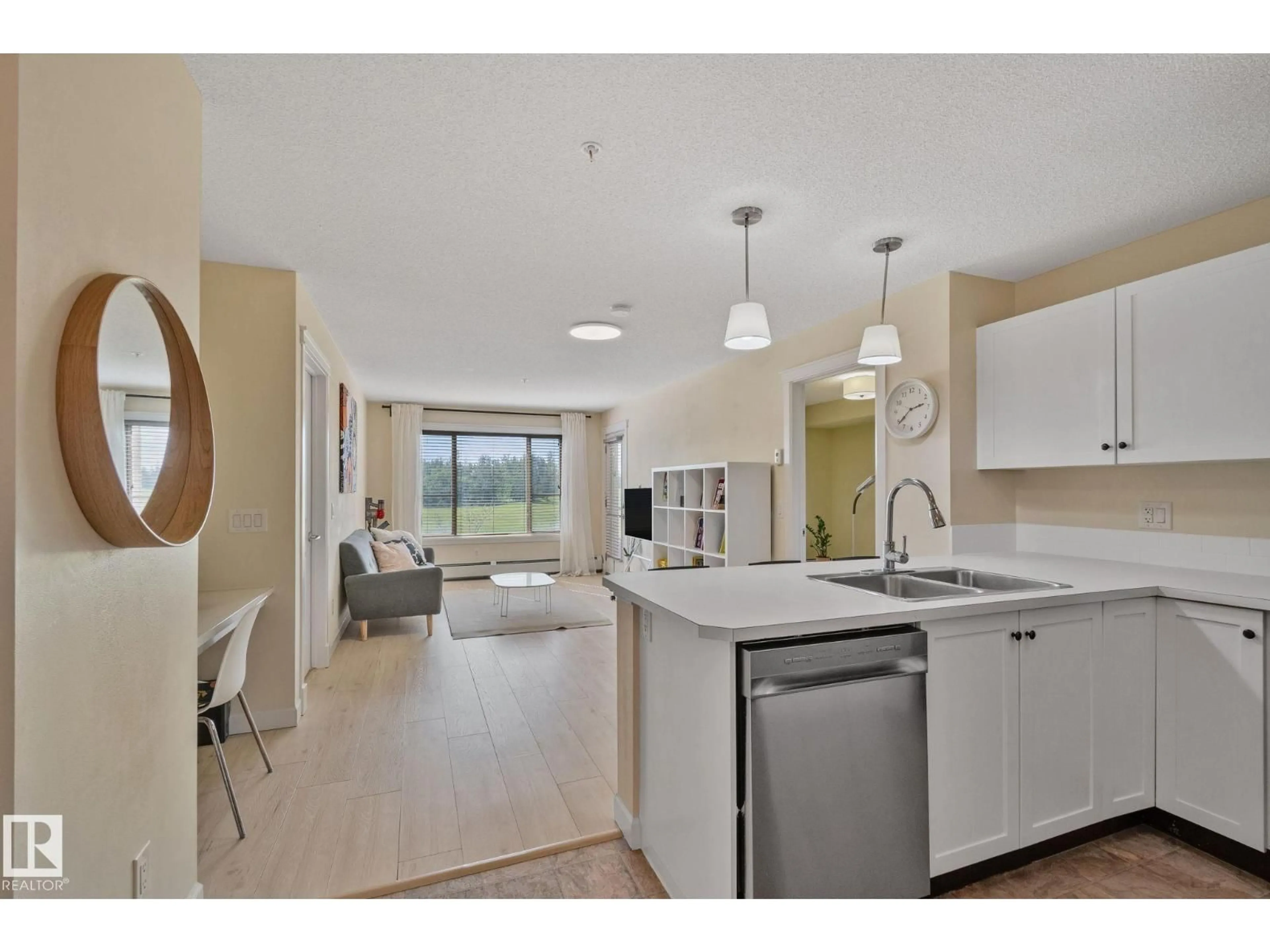 Open concept kitchen, unknown for #212 - 3715 WHITELAW LN, Edmonton Alberta T6W2C3