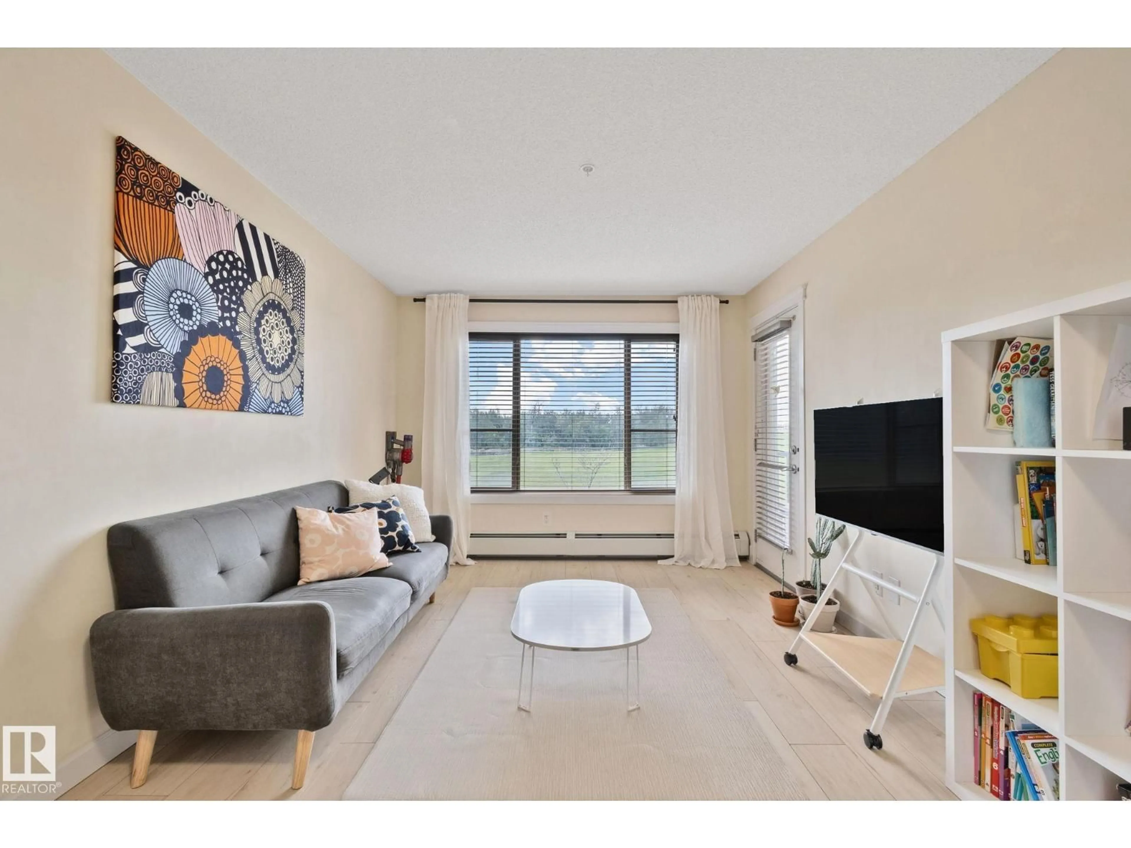 Living room with furniture, unknown for #212 - 3715 WHITELAW LN, Edmonton Alberta T6W2C3