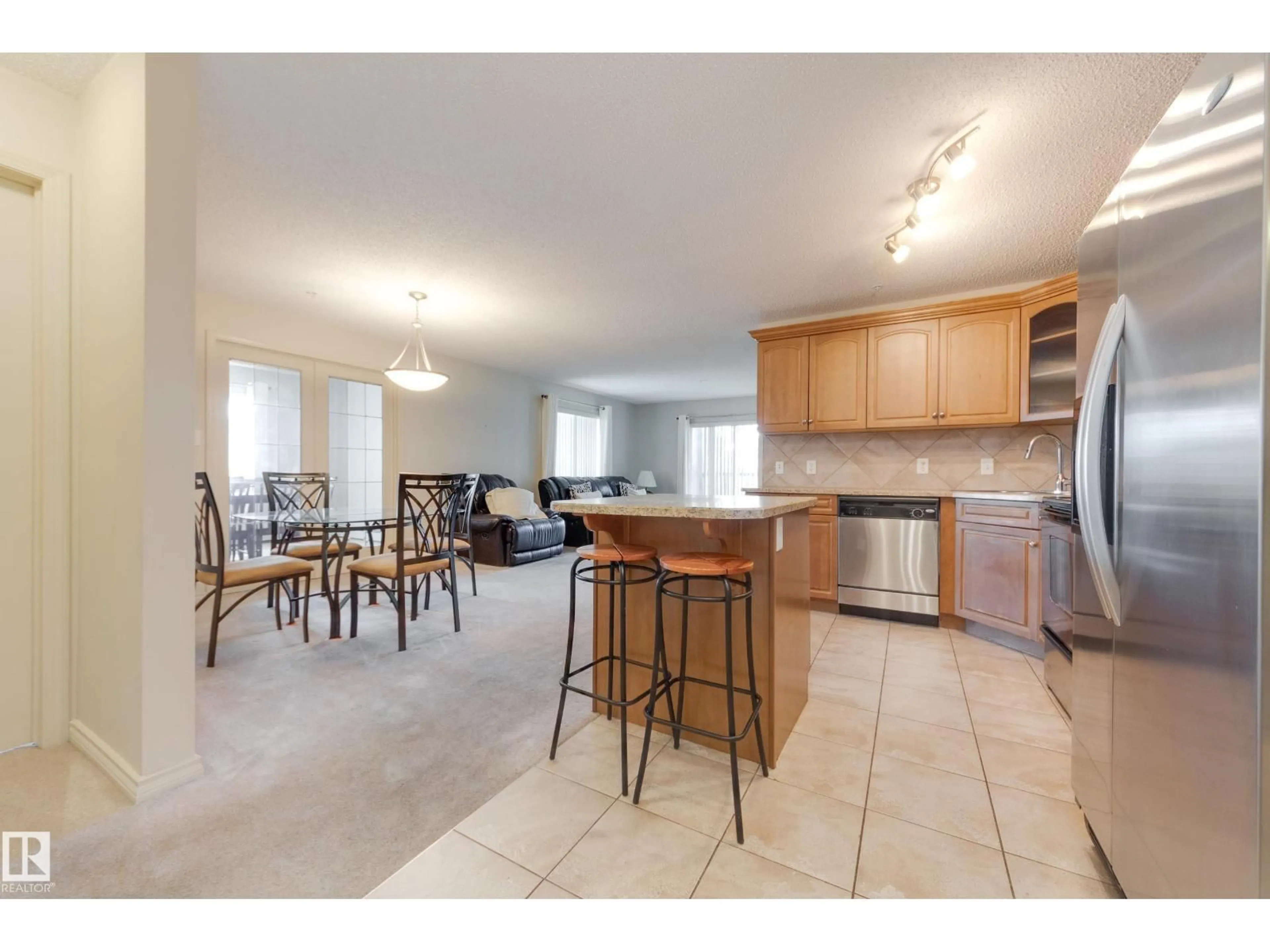 Open concept kitchen, ceramic/tile floor for 2436 - 225 GUARDIAN RD, Edmonton Alberta T5T2P5