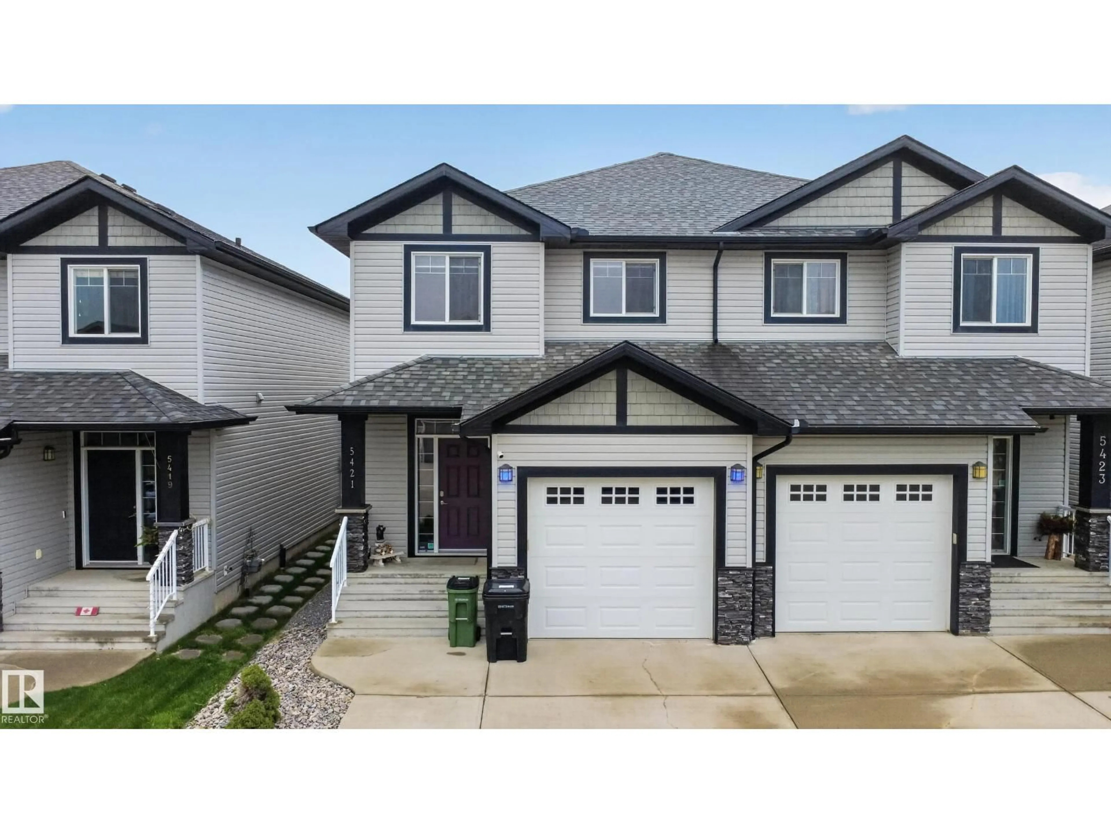 Home with vinyl exterior material, street for NW - 5421 167A AV, Edmonton Alberta T5Y0R4