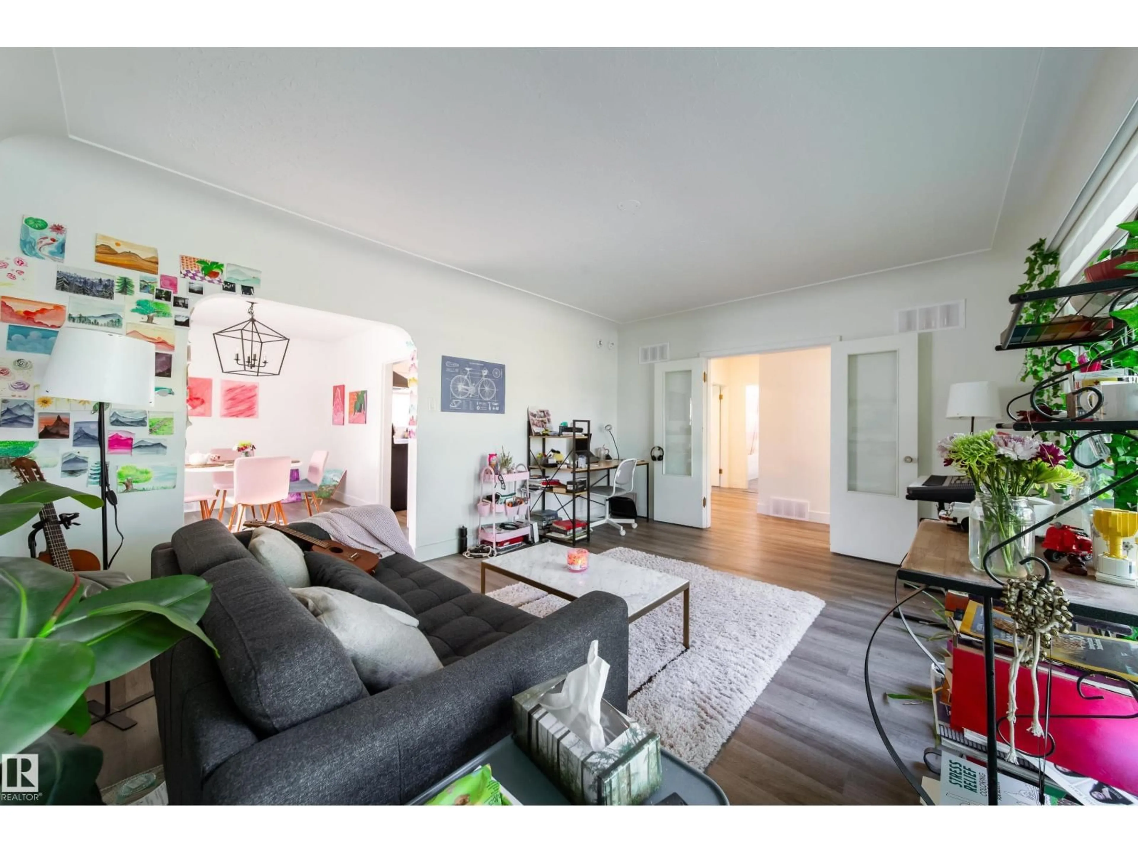 Living room with furniture, unknown for 10671 63 AV, Edmonton Alberta T6H1P7