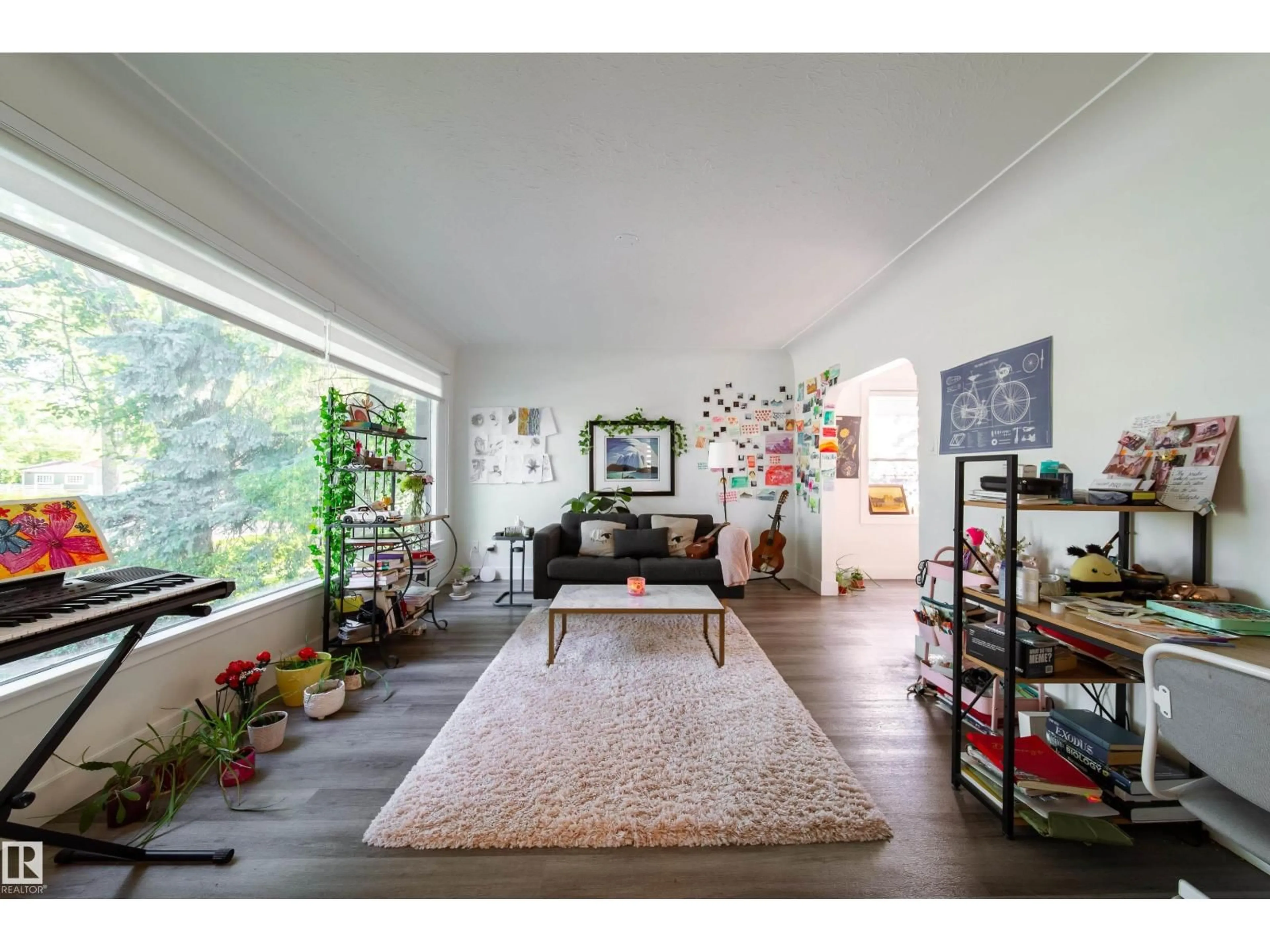 Living room with furniture, unknown for 10671 63 AV, Edmonton Alberta T6H1P7