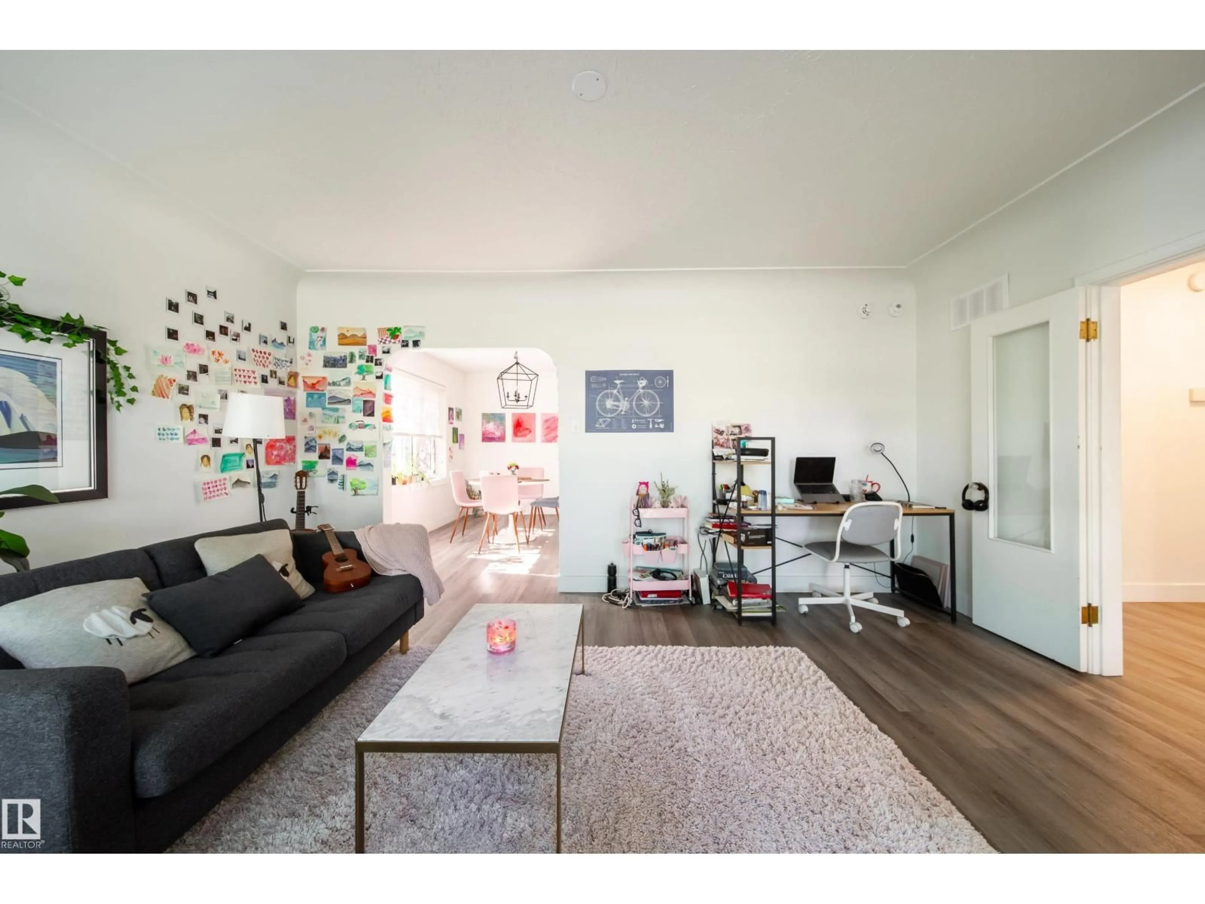 Living room with furniture, unknown for 10671 63 AV, Edmonton Alberta T6H1P7