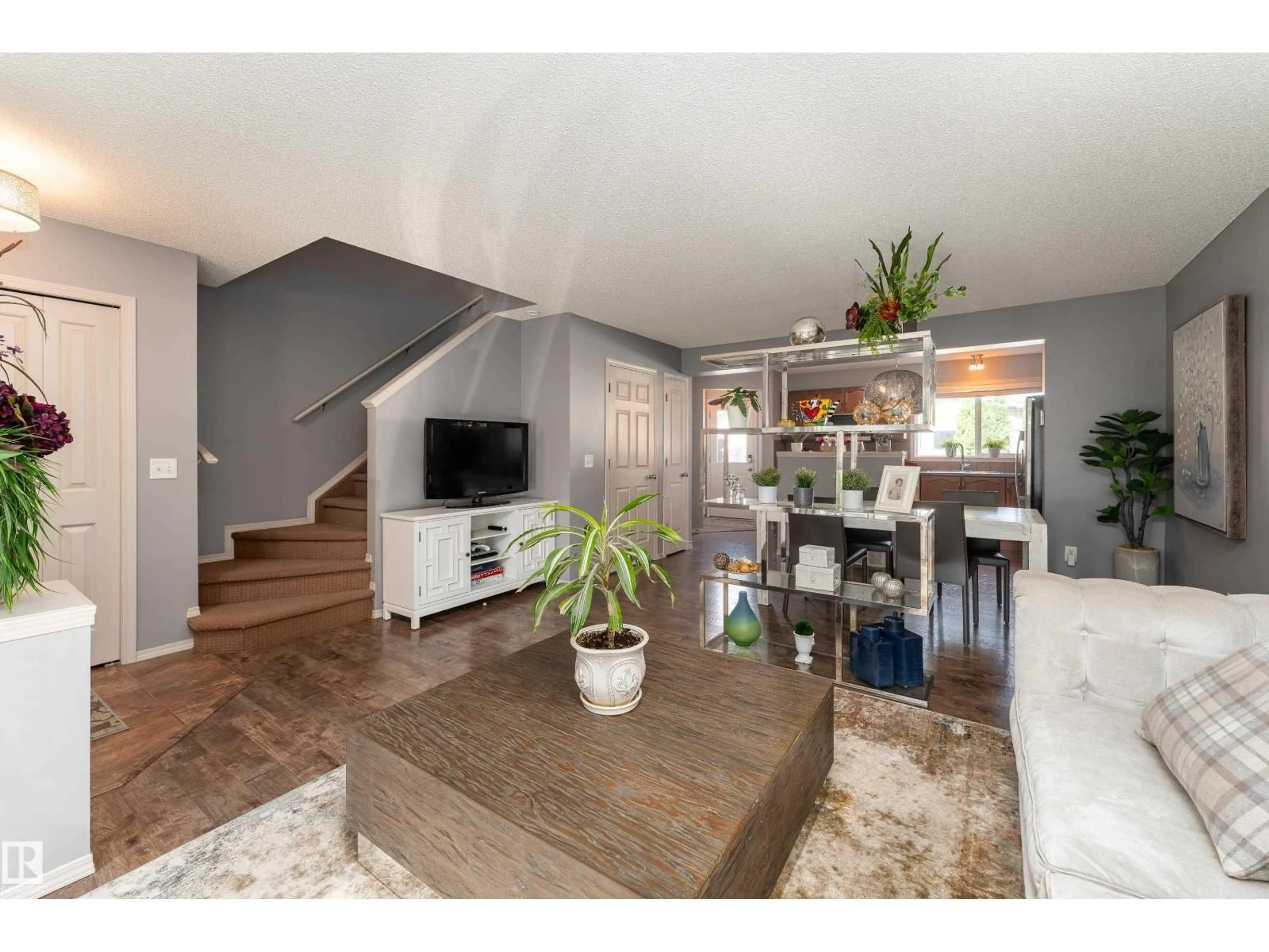 Living room with furniture, wood/laminate floor for 5992 SOUTH TERWILLEGAR BV, Edmonton Alberta T6R0K4