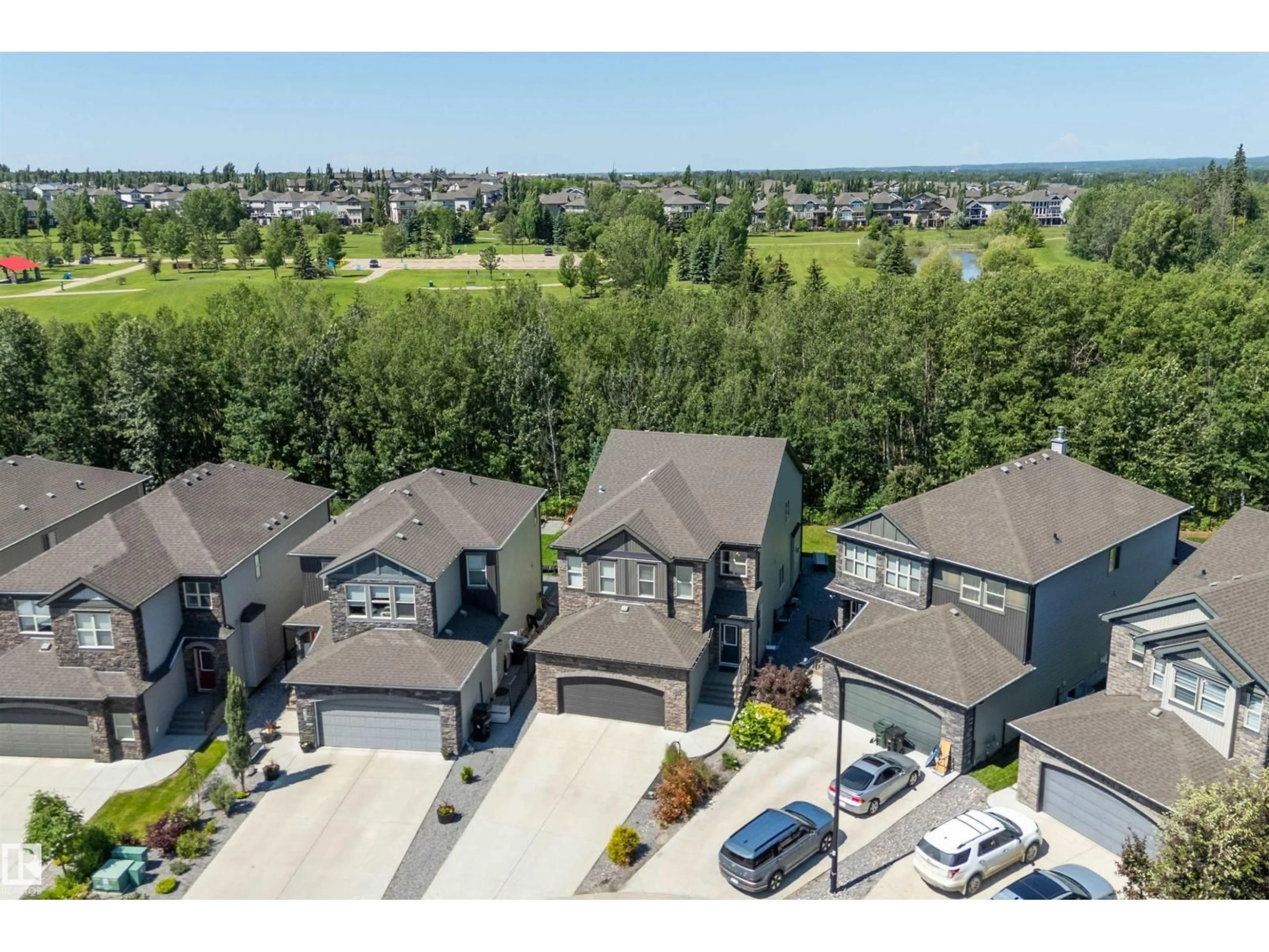 A pic from outside/outdoor area/front of a property/back of a property/a pic from drone, mountain view for 71 GREENBURY MR, Spruce Grove Alberta T7X0M1