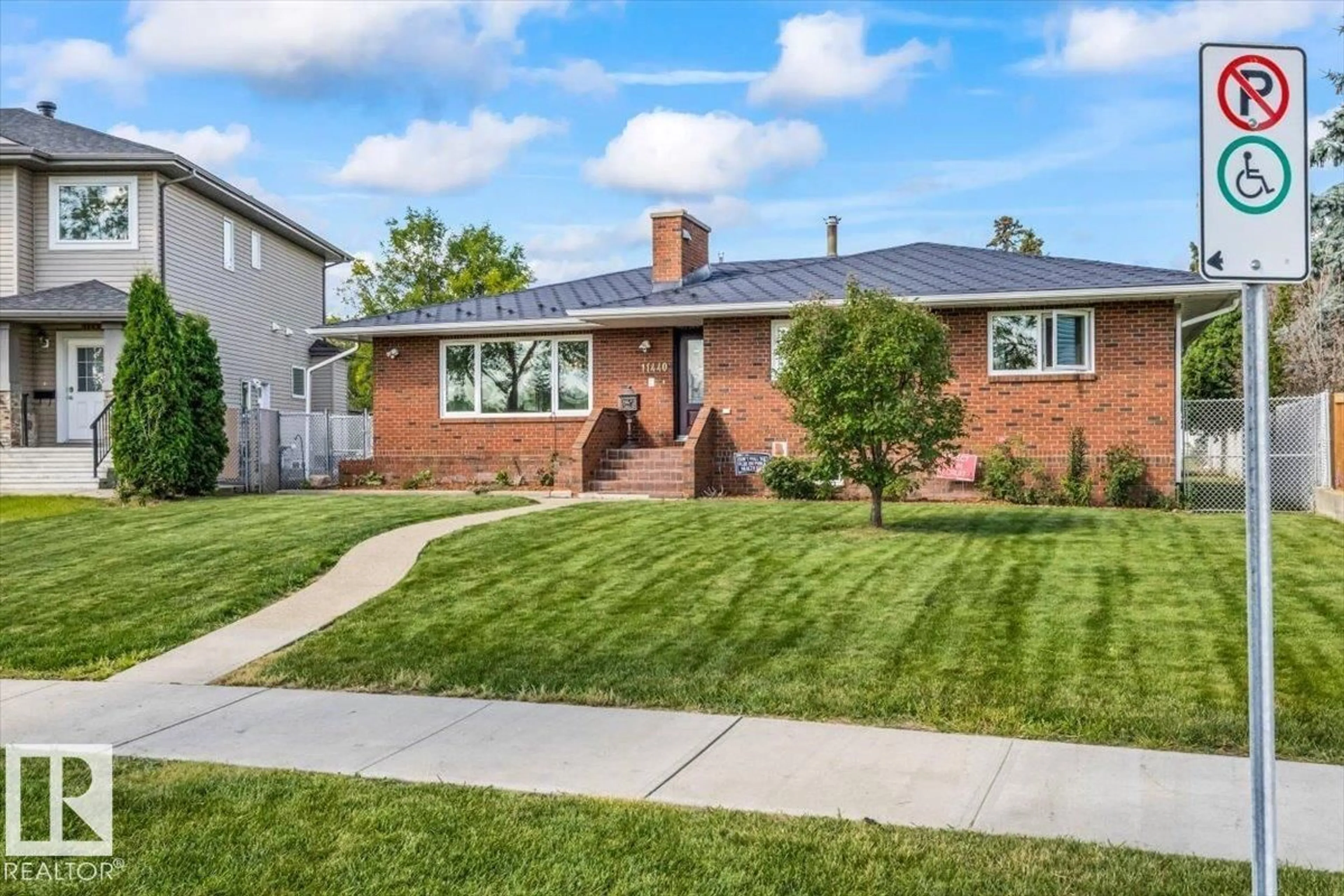 Home with brick exterior material, street for 11440 104 ST NW, Edmonton Alberta T5G2K9