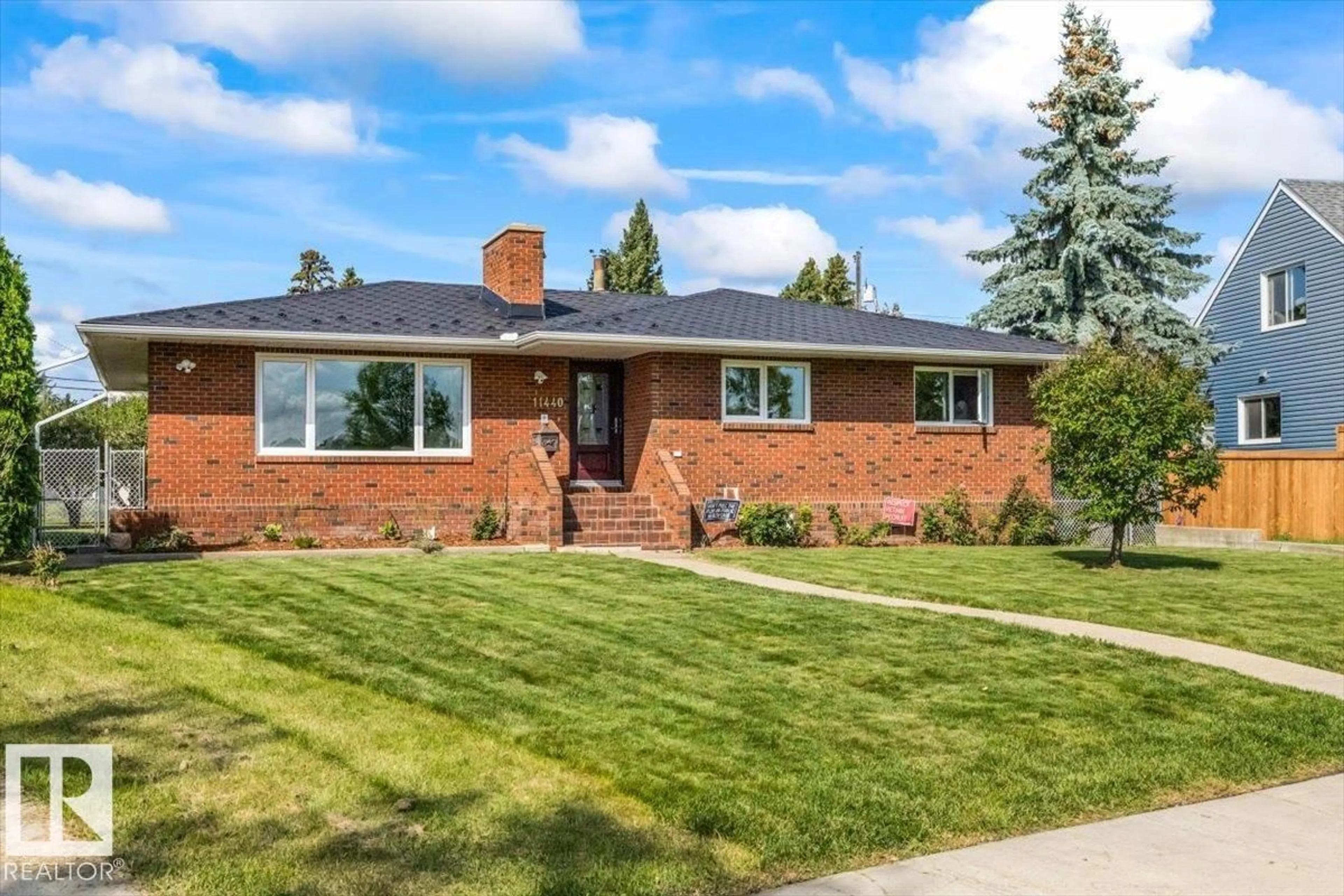 Home with brick exterior material, street for 11440 104 ST NW, Edmonton Alberta T5G2K9