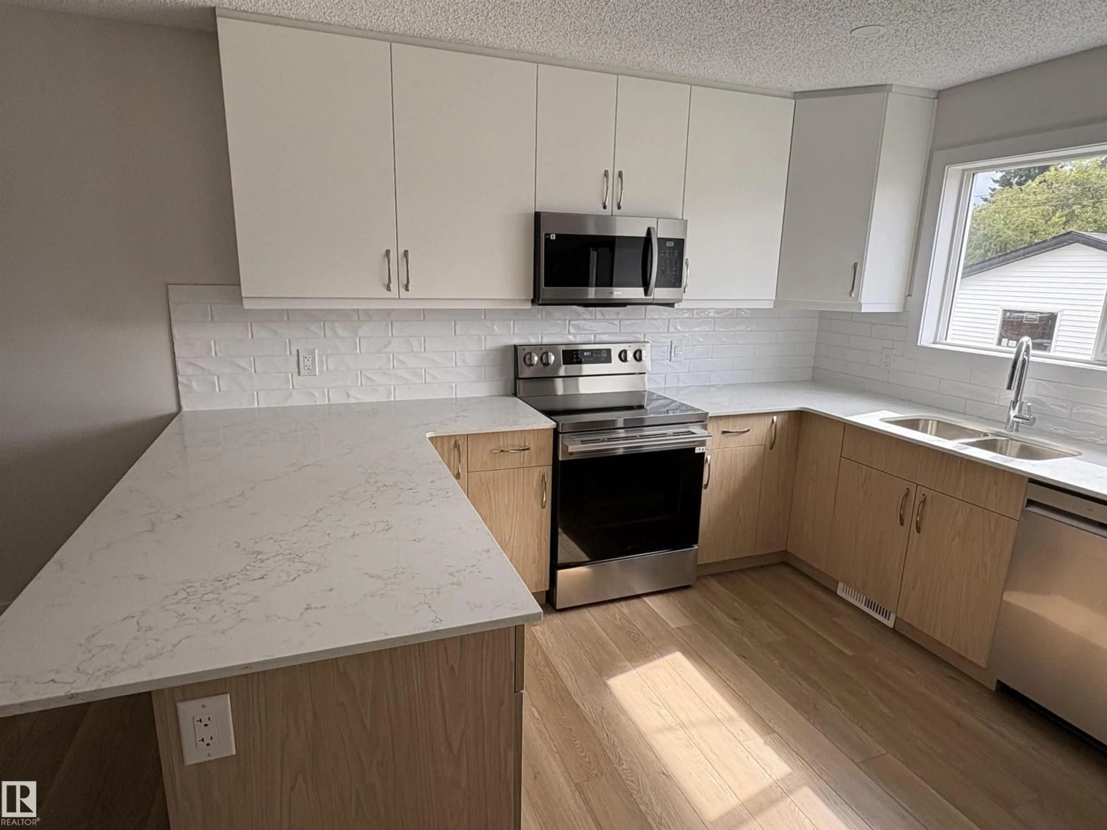 Open concept kitchen, unknown for 4843 115 AV, Edmonton Alberta T5W0W3