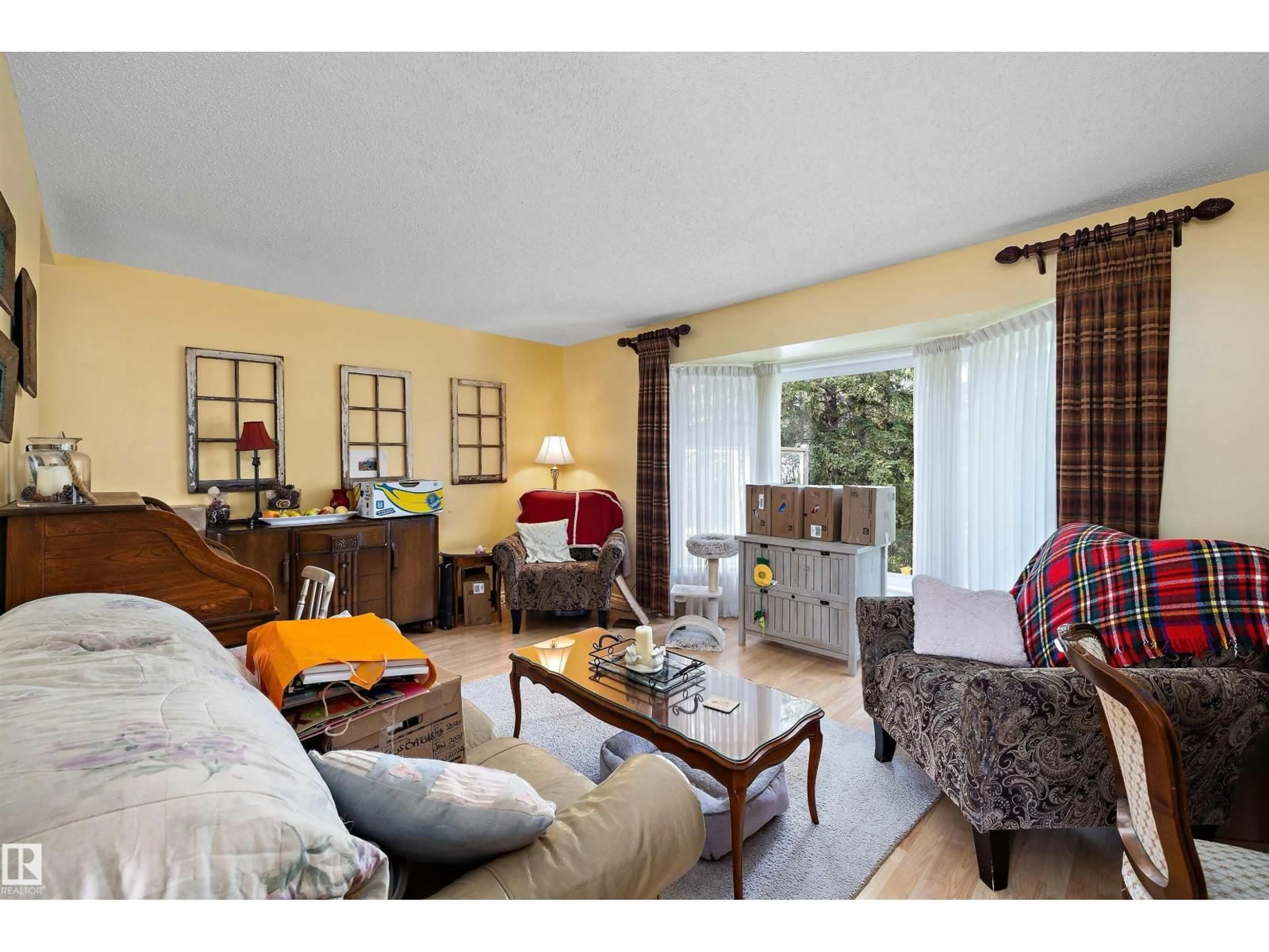 Living room with furniture, wood/laminate floor for 5 WESTWOOD PL, Spruce Grove Alberta T7X1S4