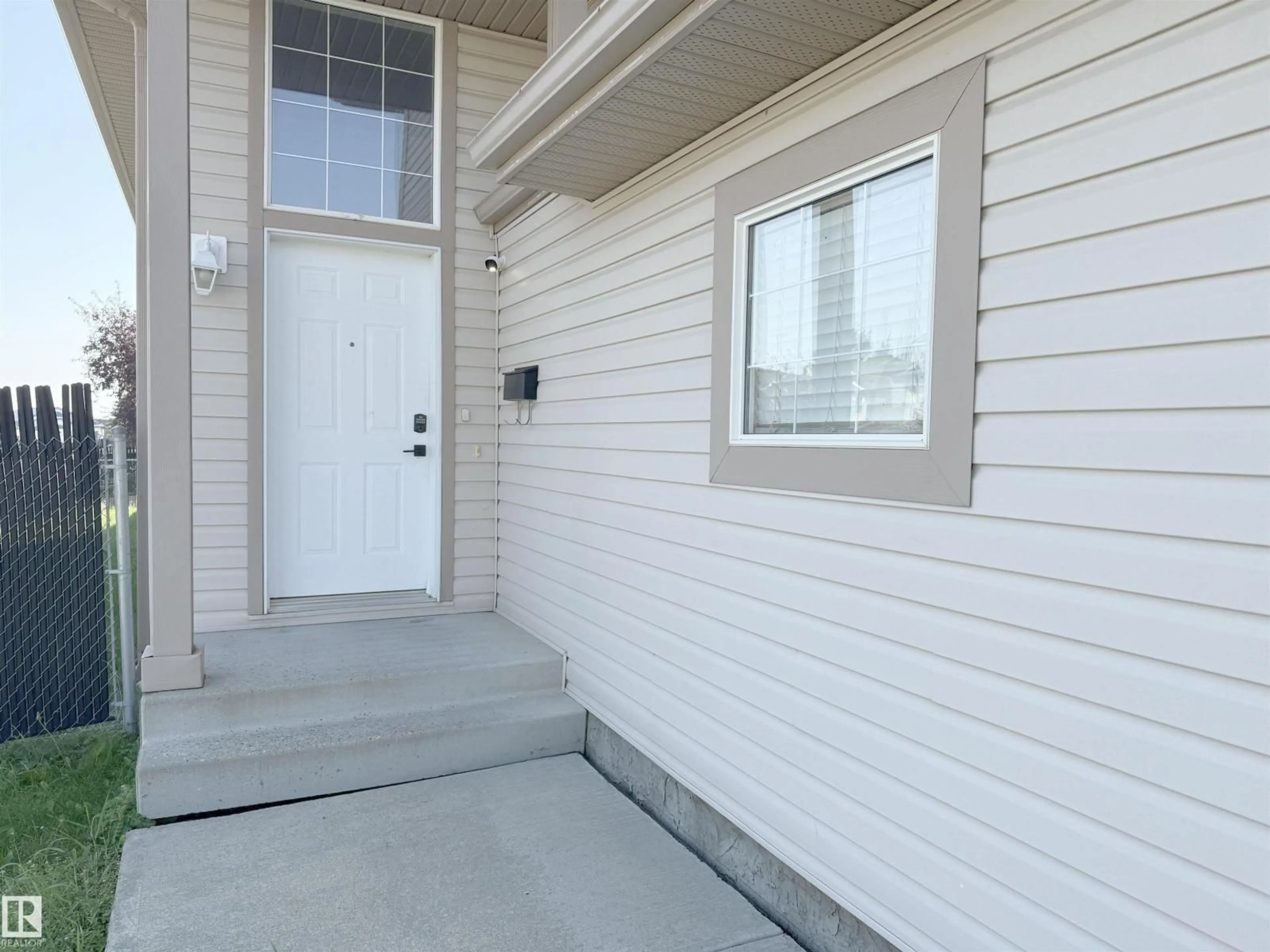 Home with vinyl exterior material, street for NW - 3799 21 ST, Edmonton Alberta T6T1P3