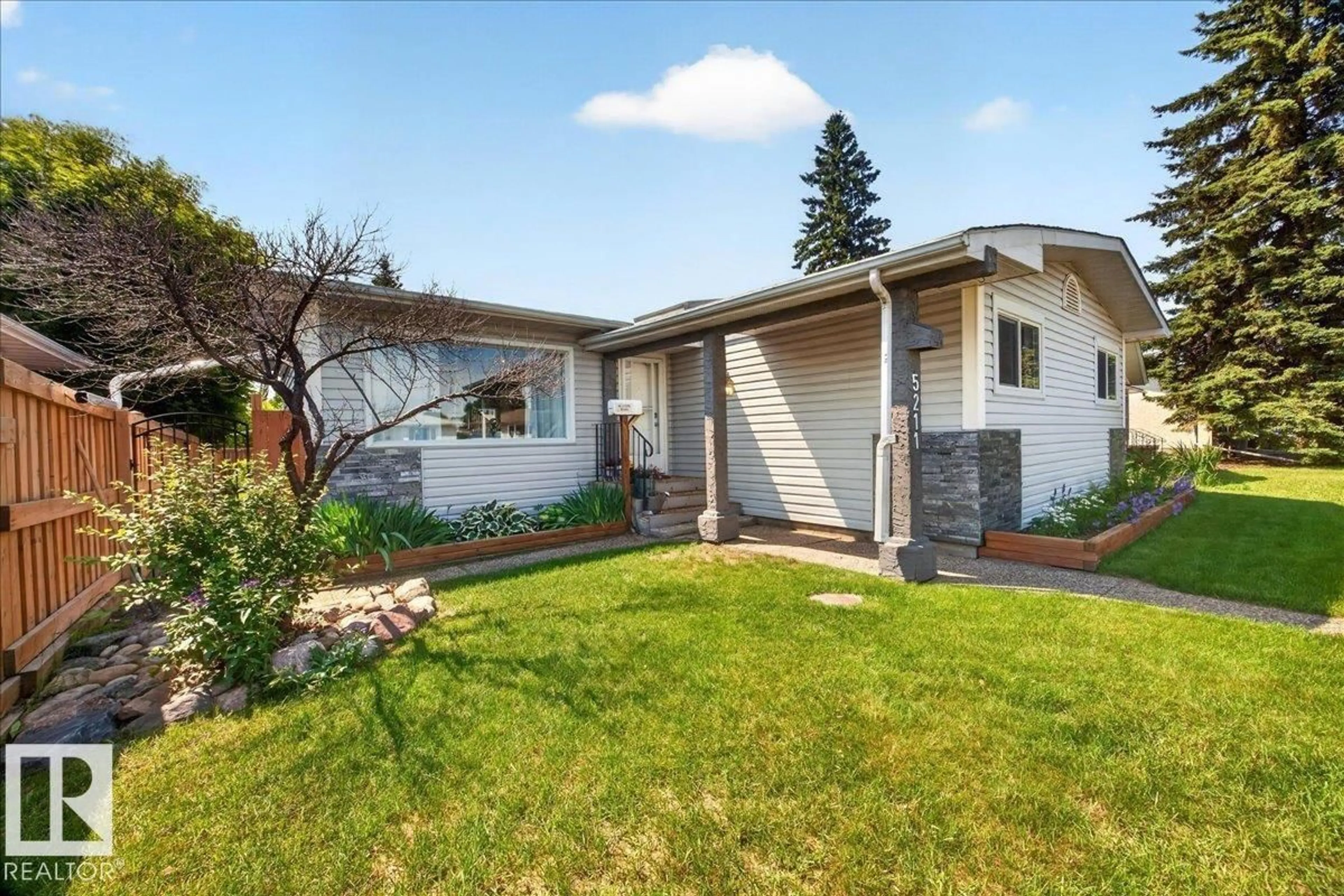 Home with vinyl exterior material, street for 5211 94A AV, Edmonton Alberta T6B0Y6